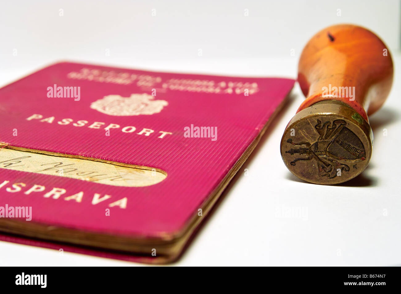 monarchy of Yugoslavia passport from 1933 beside old seal Stock Photo