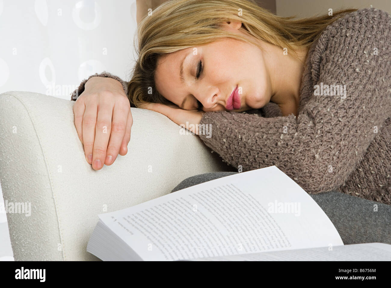 Woman sleeping with book Stock Photo Alamy