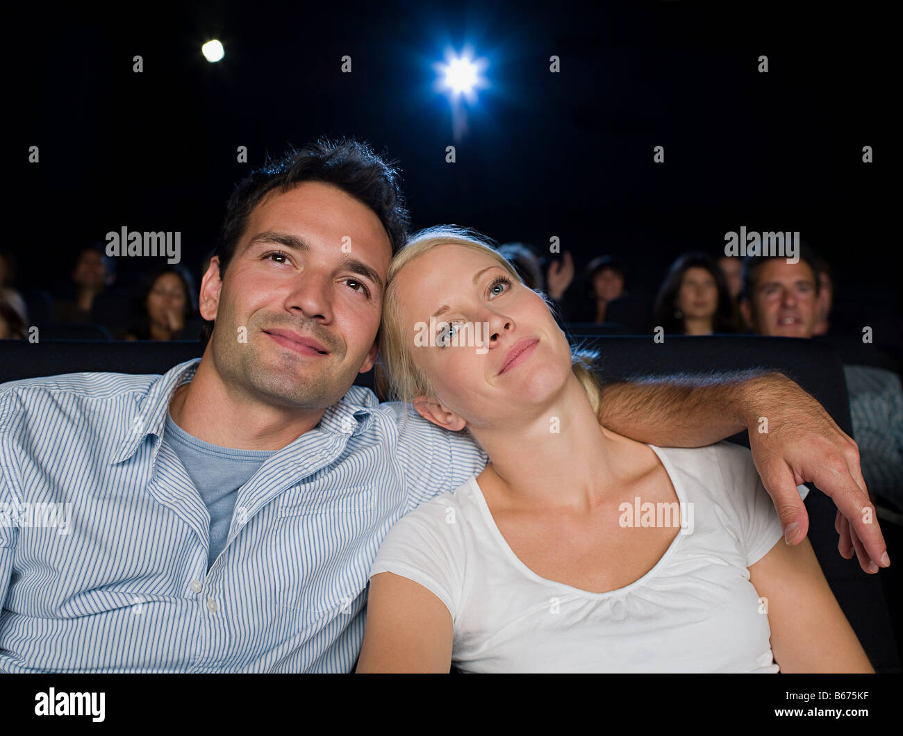 A couple watching a movie Stock Photo Alamy