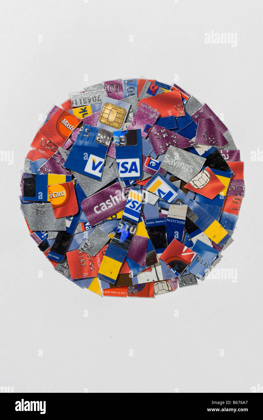 Circular montage of cut up assorted bank credit cards Stock Photo