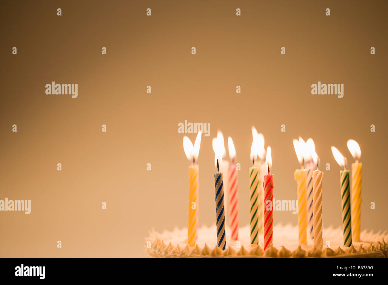 Candles on a birthday cake Stock Photo Alamy