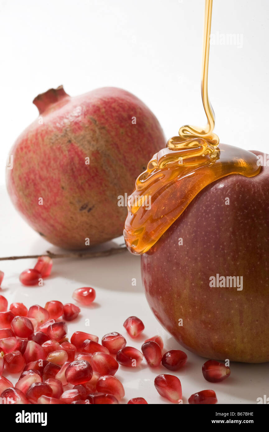 Apple pomegranate seeds and honey Symbols of Roah Hashanah the Jewish