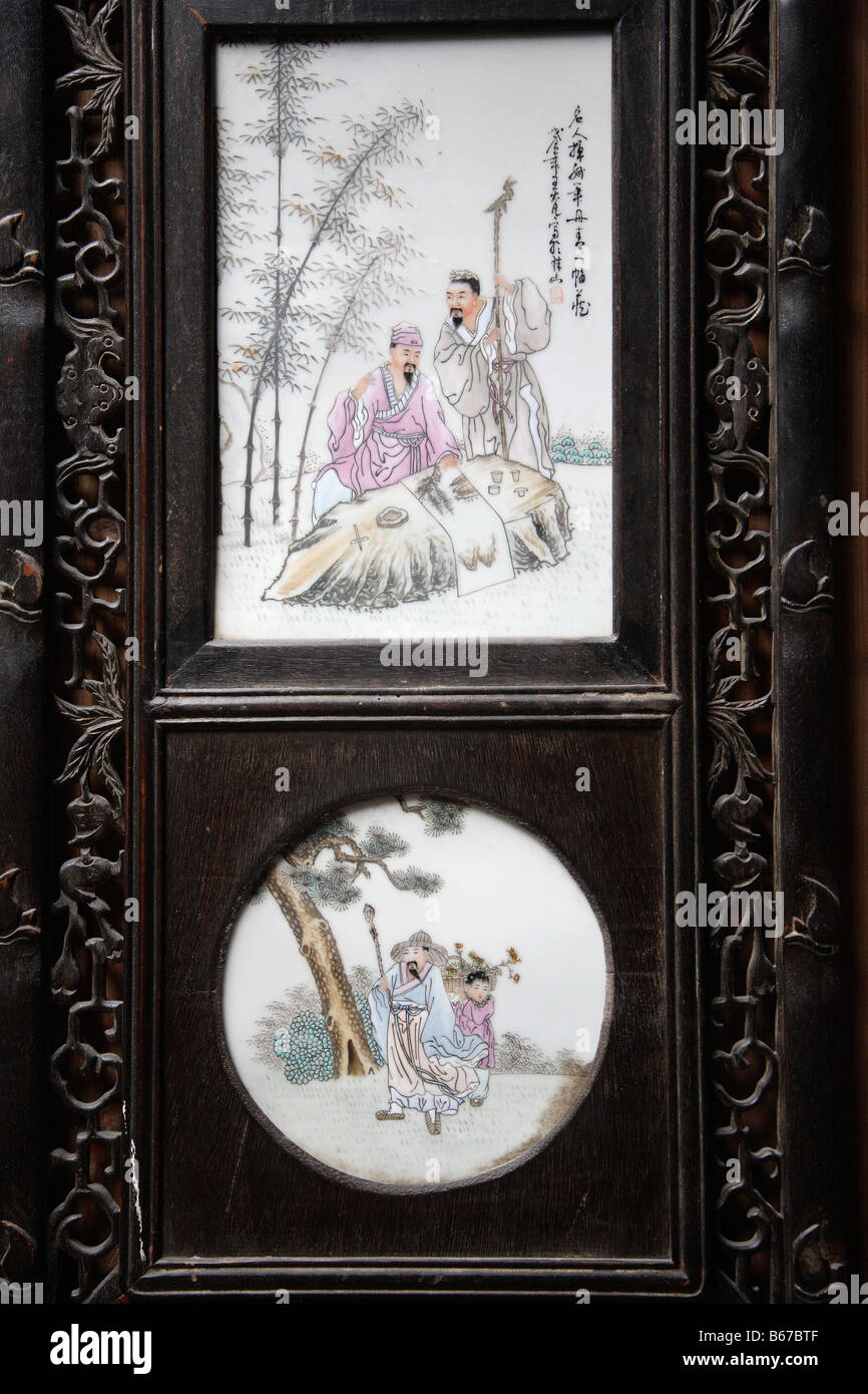 China Anhui Province Xidi village painted carved door detail Stock Photo