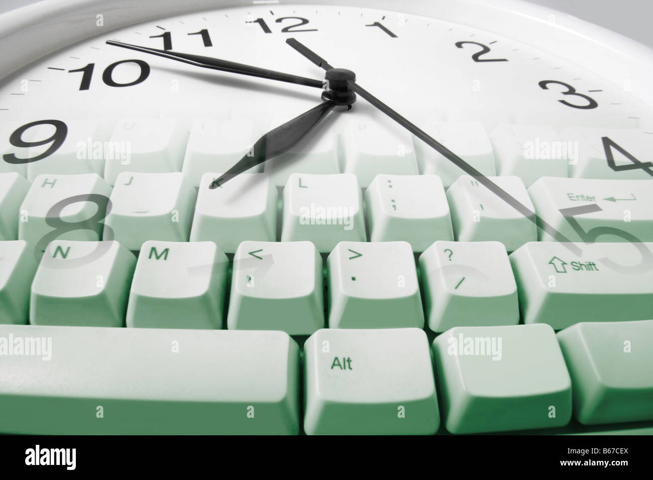 Clock and Computer Keyboard Stock Photo Alamy