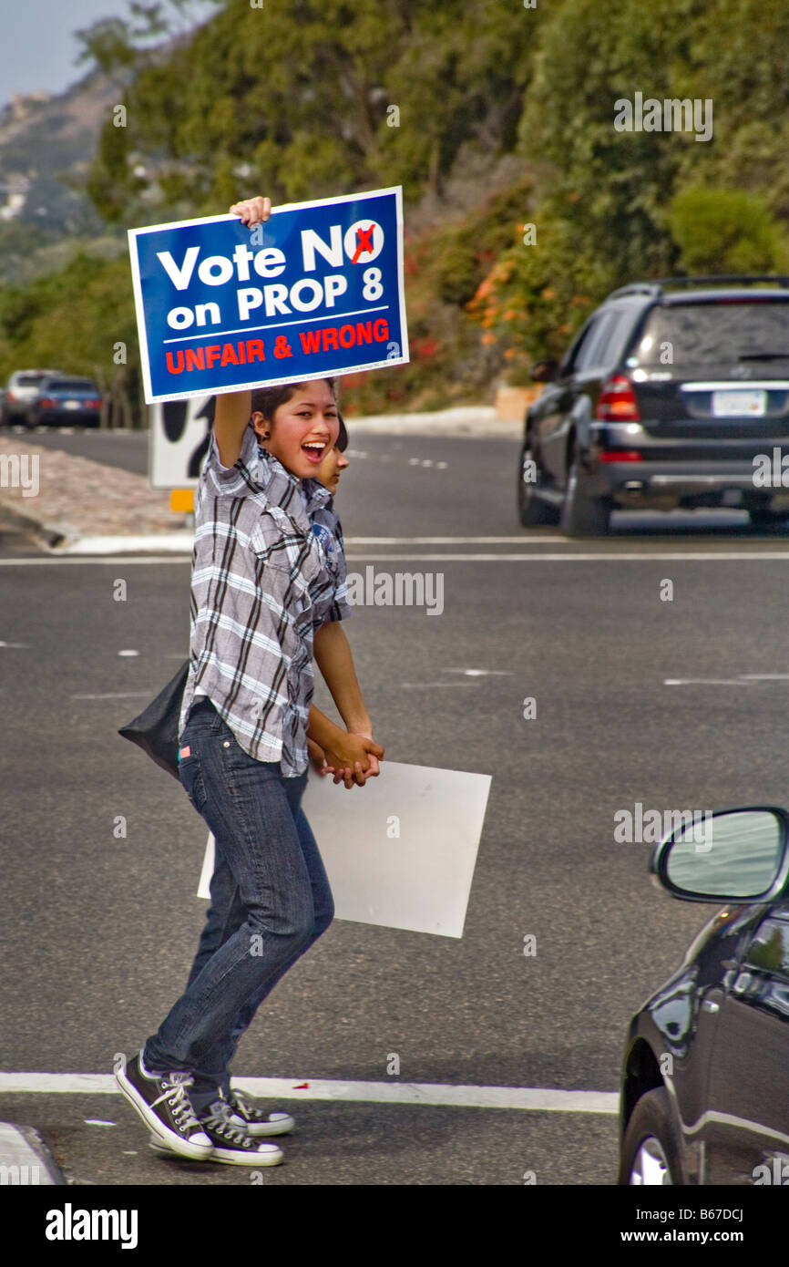 Teenage girl protest against state ballot proposition at Pacific Coast Highway in Laguna Niguel, CA, USA Stock Photo
