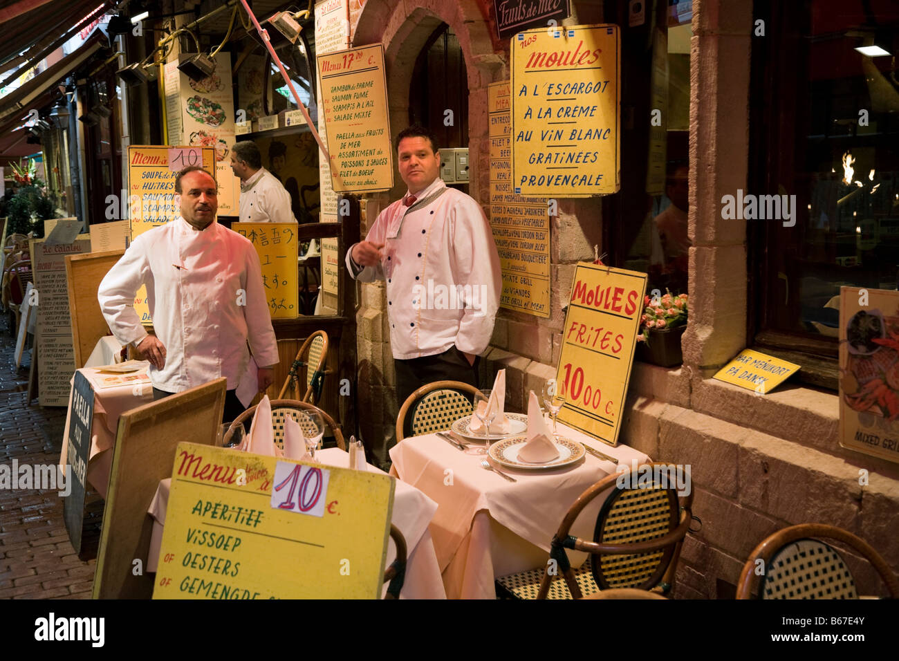 Pavement tables and waiters outside a seafood restaurant. Brussels. Belgium. (44) Stock Photo