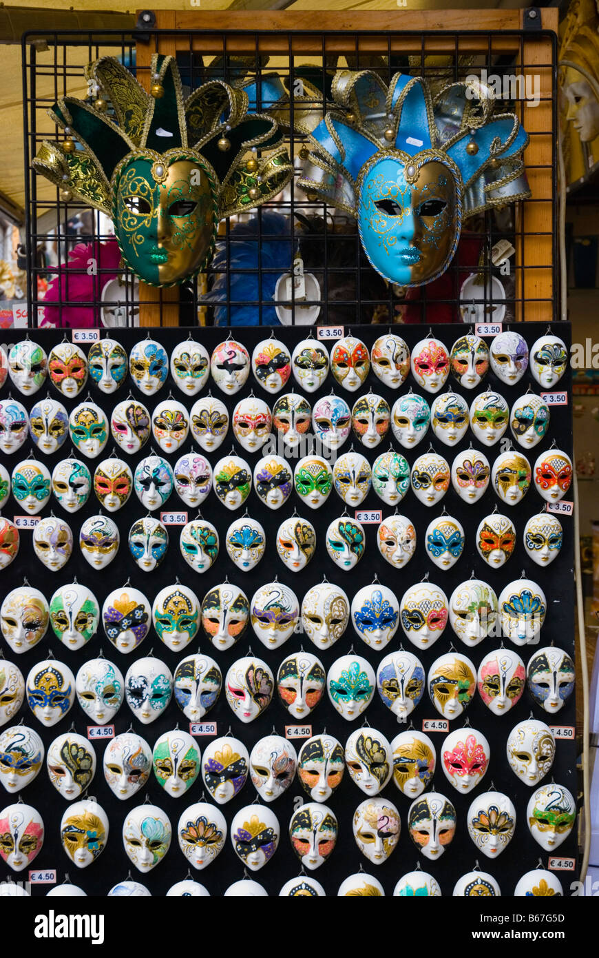 Carnevale masks at Rialto market in Venice Italy Europe Stock Photo