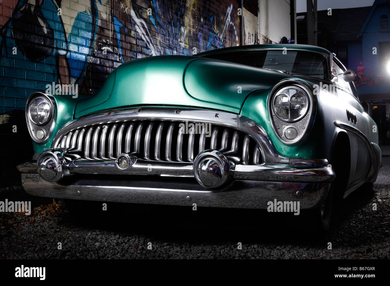 License available at MaximImages.com - 1953 Buick Roadmaster green vintage retro car in an alley Stock Photo