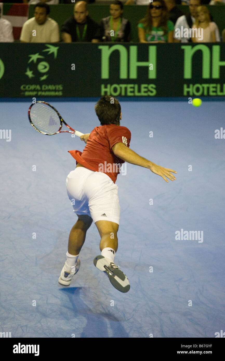 Spanish tennis player Fernando Verdasco can´t reach a shot during the 2008 Davis Cup final against argentinian player Acasuso Stock Photo