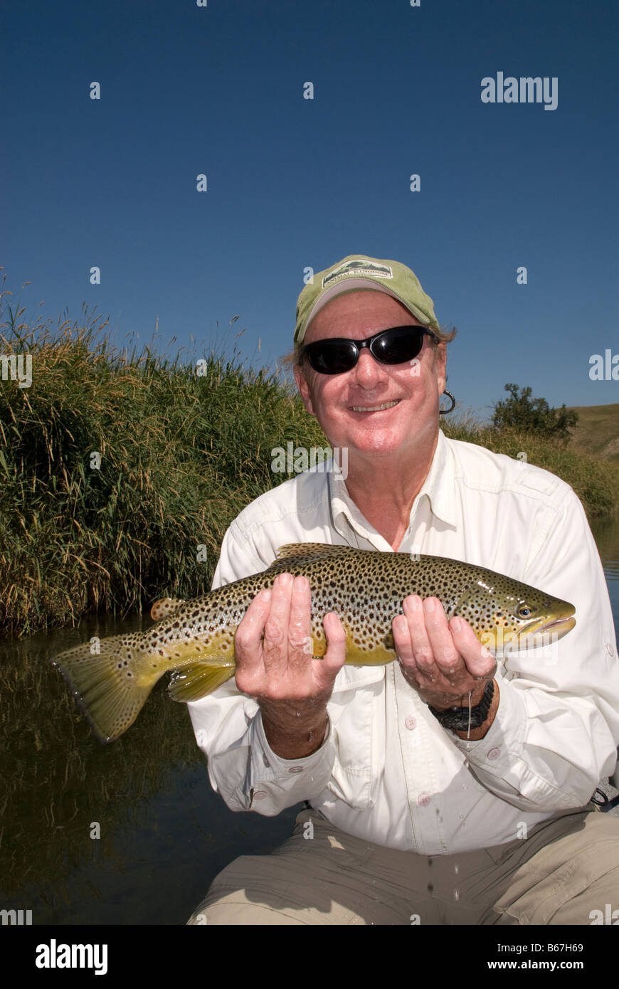 A large dry fly used as a strike indicator for fly fishing on the Bow  River, Alberta,Canada Stock Photo - Alamy