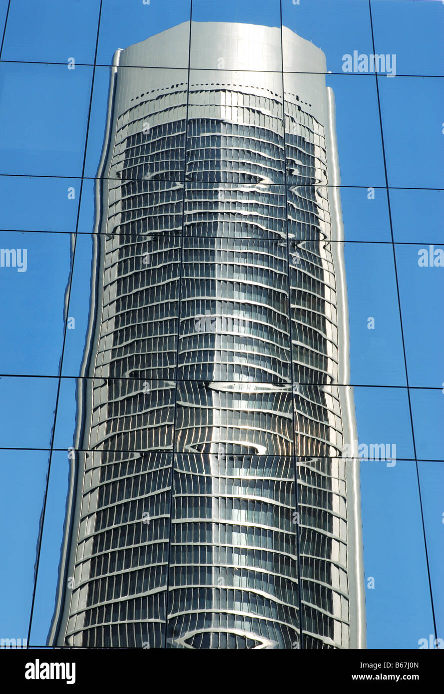 Tower Sacyr reflected on glass facade. Madrid. Spain. Stock Photo