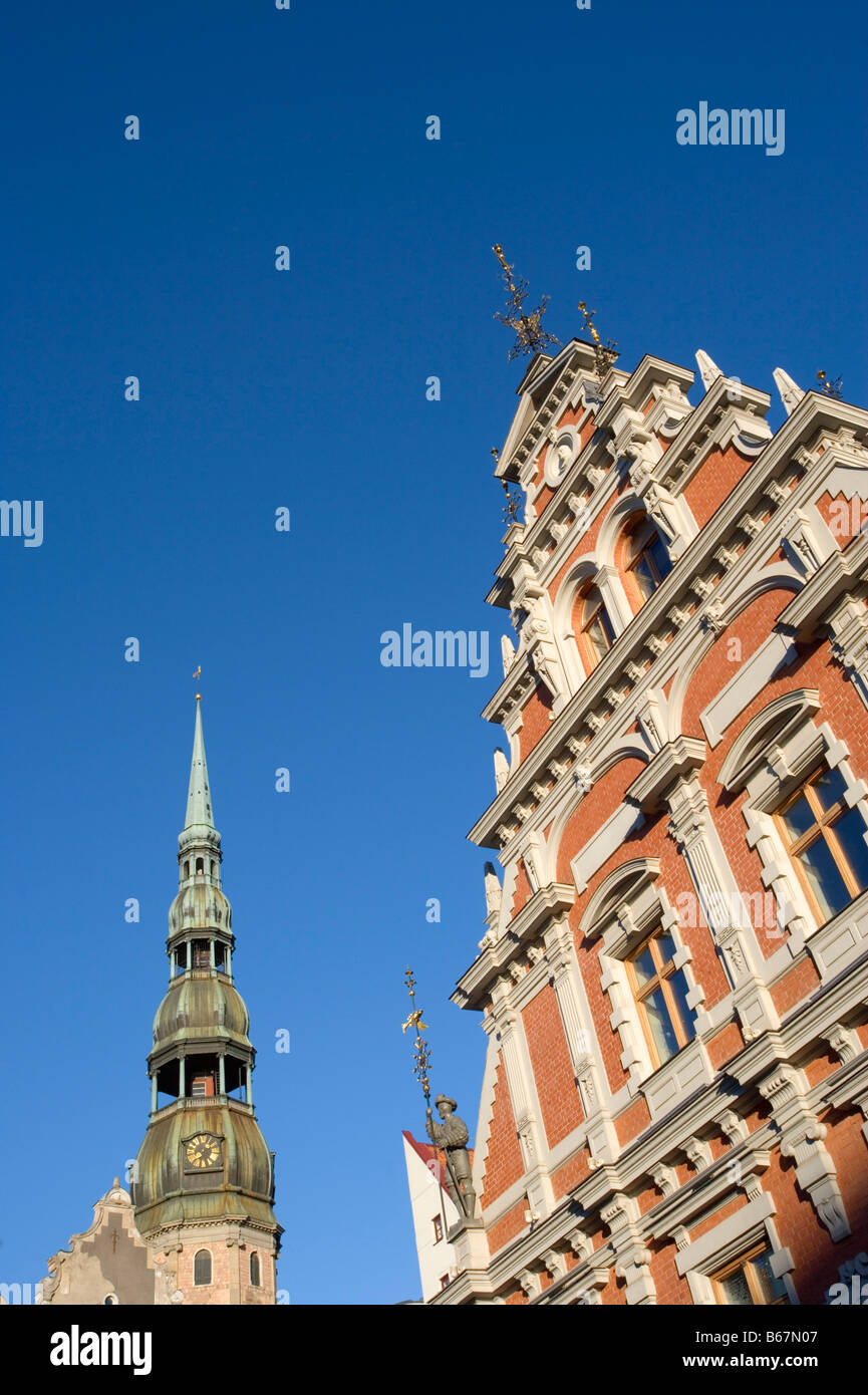 House of the Blackheads guild and church tower of Saint Peters church, Riga, Latvia Stock Photo