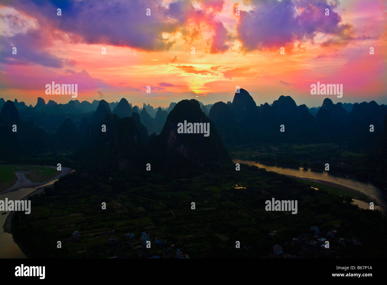 Rock formations on a landscape, Li River, XingPing, Yangshuo, Guangxi Province, China Stock Photo