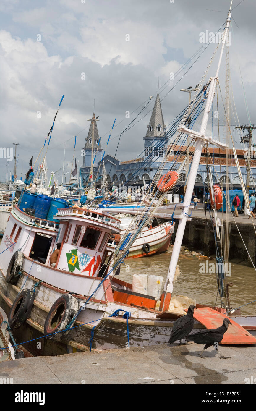 Fishing Boats and vultures in the harbour outside Mercado Ver O Peso Market, Belem, Para, Brazil, South America Stock Photo