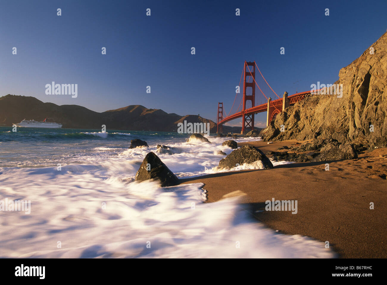 View of the Golden Gate Bridge from a beach, San Francisco, California ...