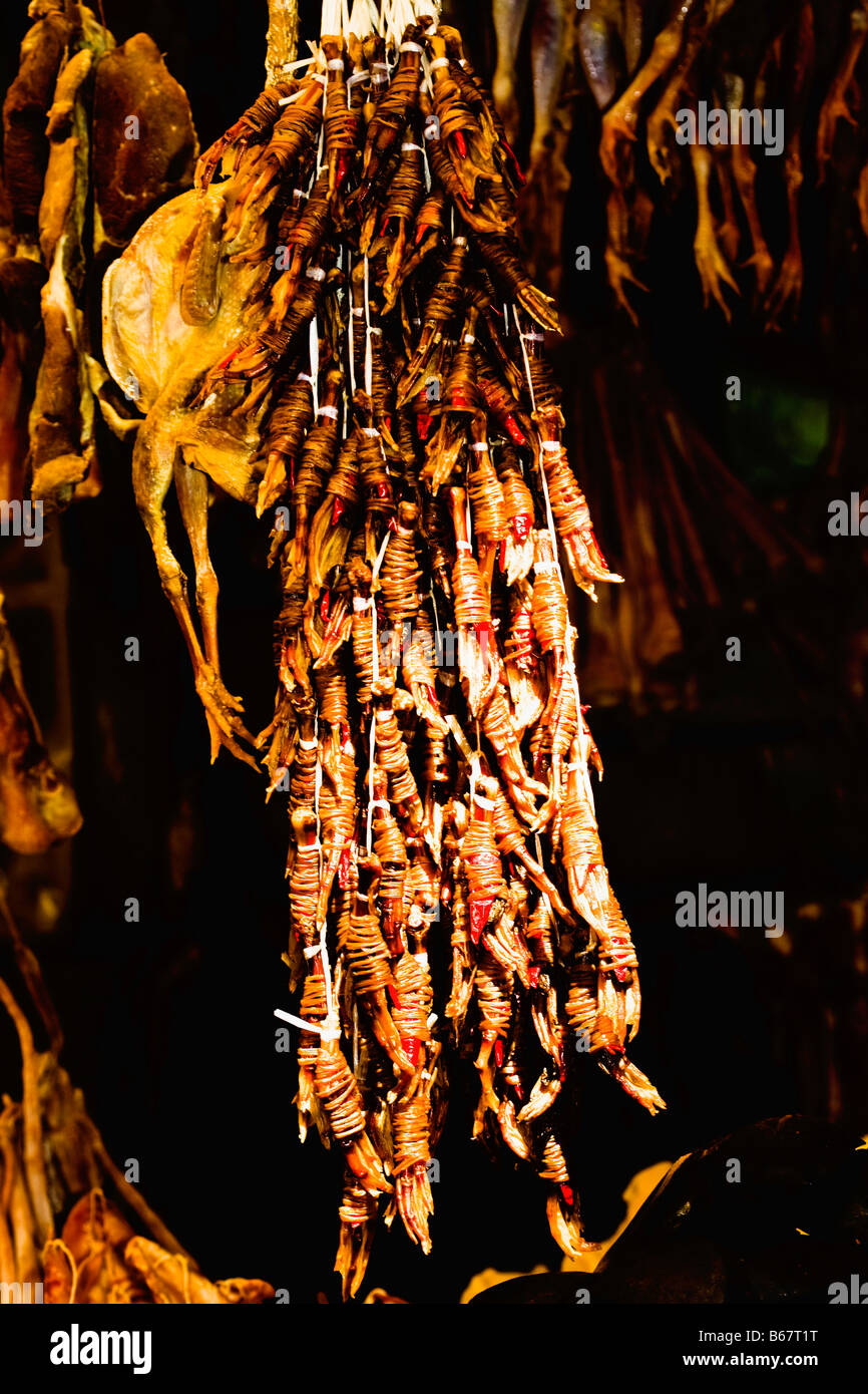 Chickens hanging at a market stall, Hefei, Anhui Province, China Stock Photo