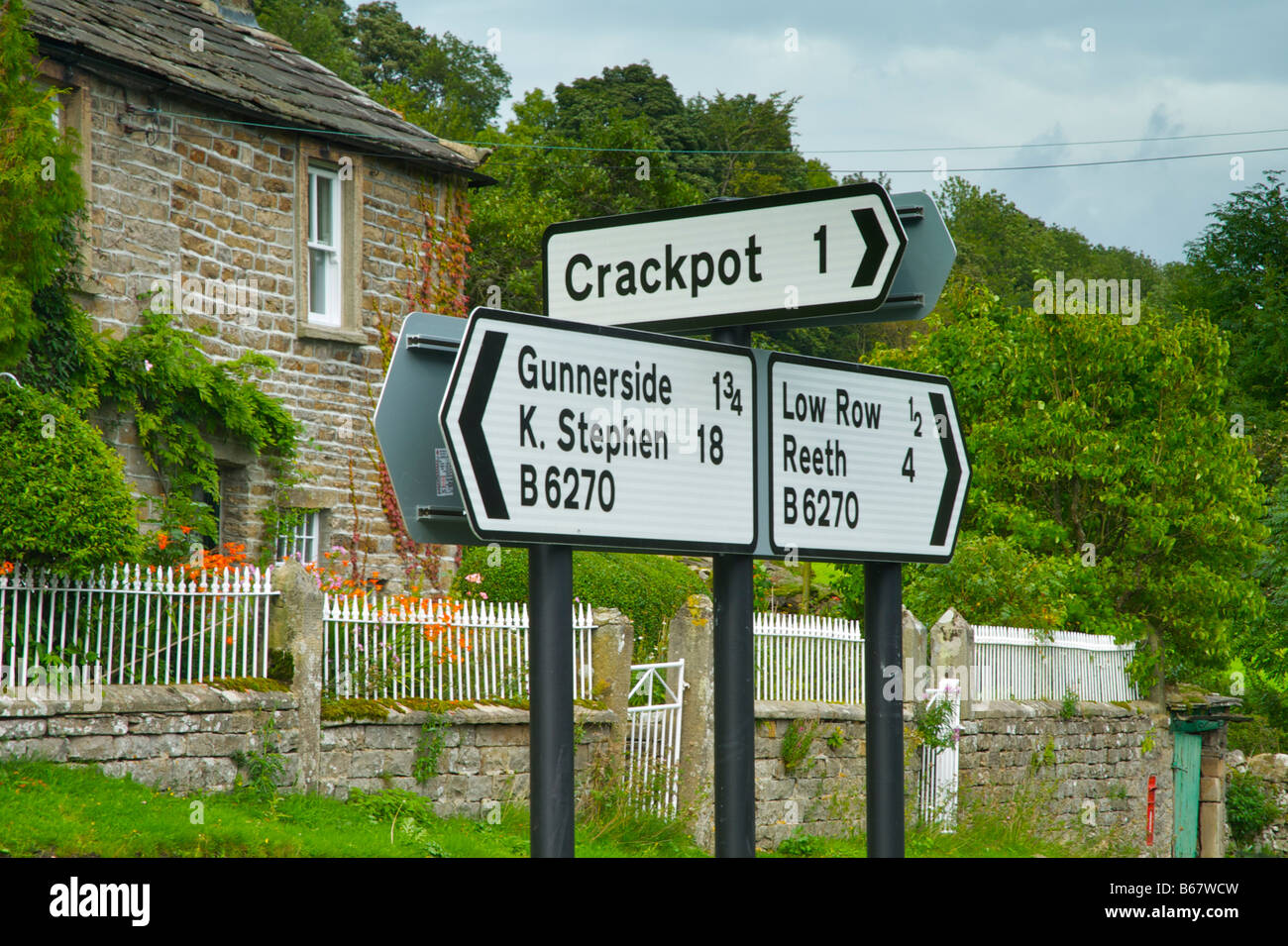 Sign pointing to the community of Crackpot, Swaledale, Yorkshire Dales National Park, North Yorkshire, England UK Stock Photo