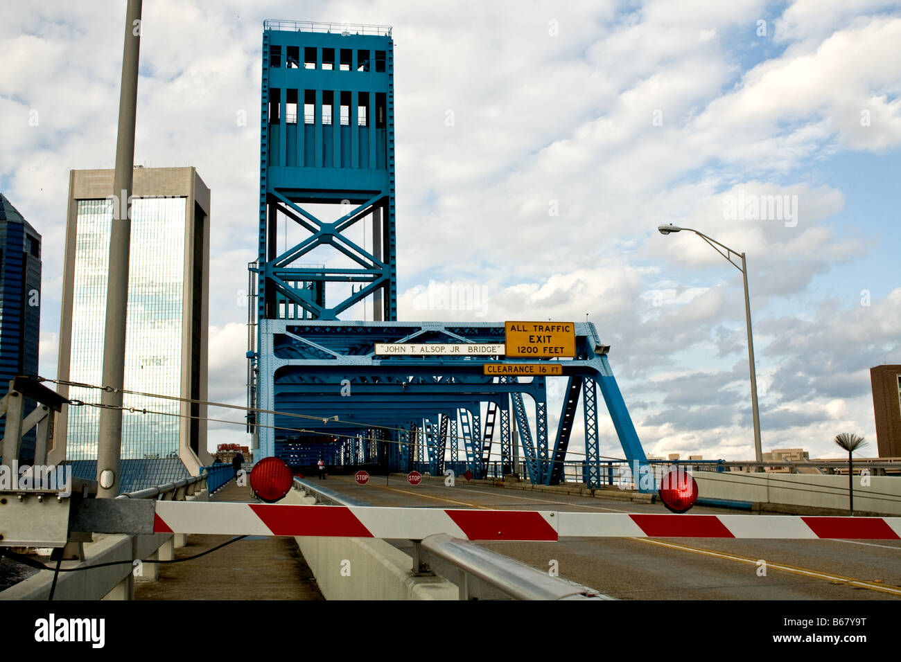 Main street bridge with red and white traffic barrier down in Jacksonville Florida Stock Photo