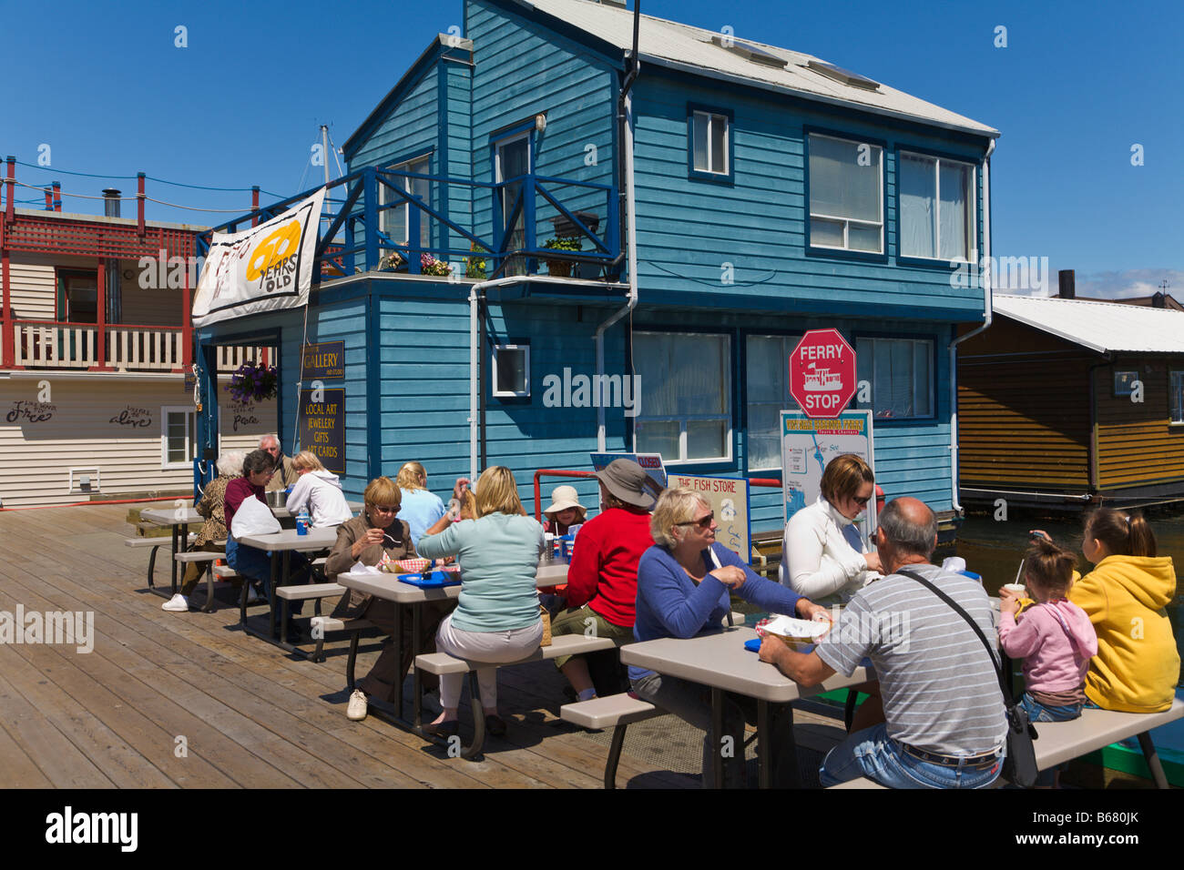People eating Fish and Chips "Fishermans Wharf" Victoria "Vancouver