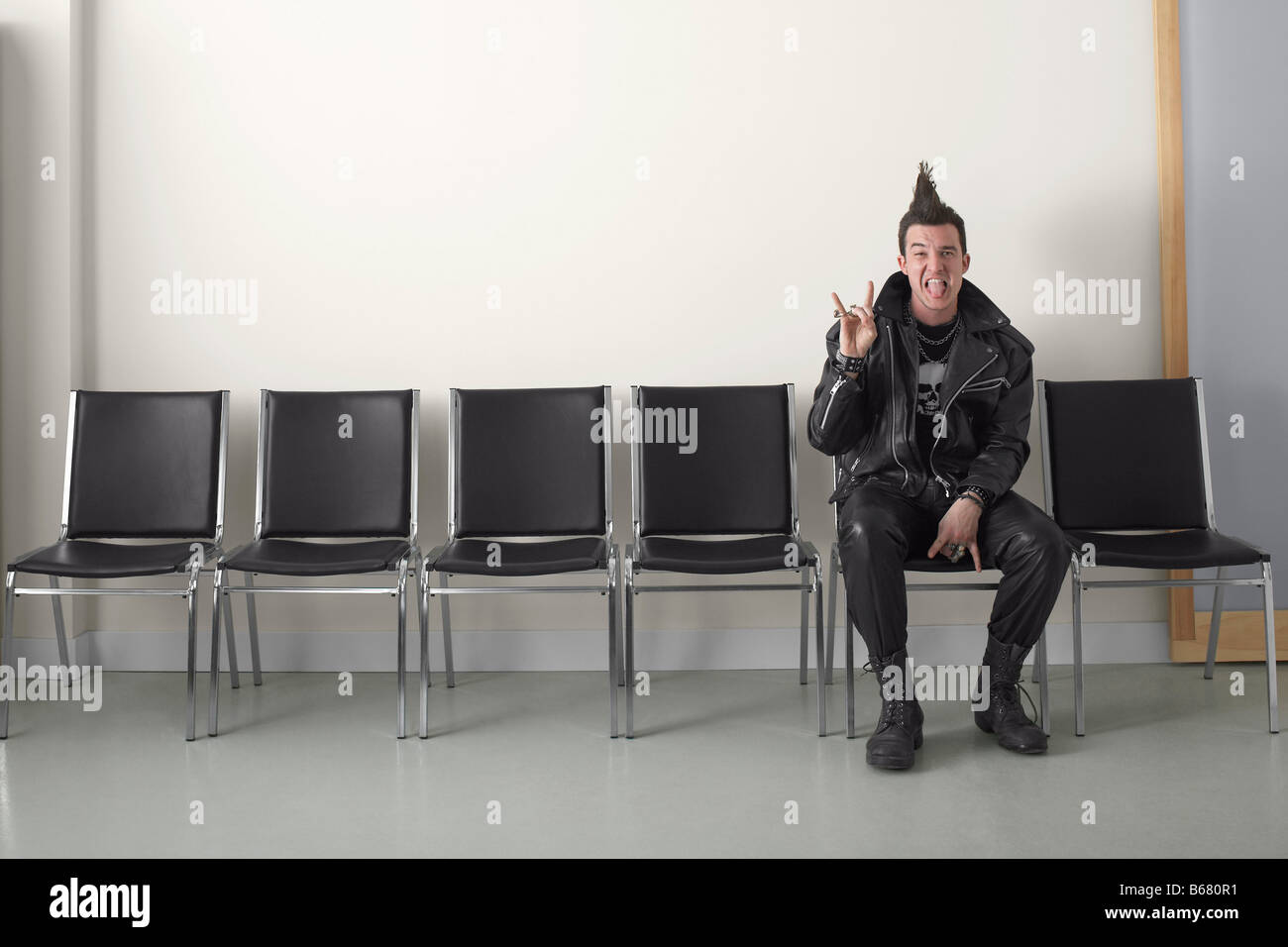 Punk in Waiting Area Stock Photo