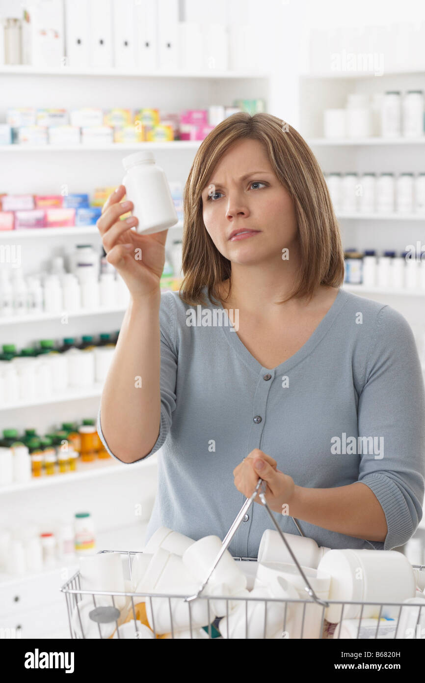 Old woman shopping in pharmacy hires stock photography and images Alamy
