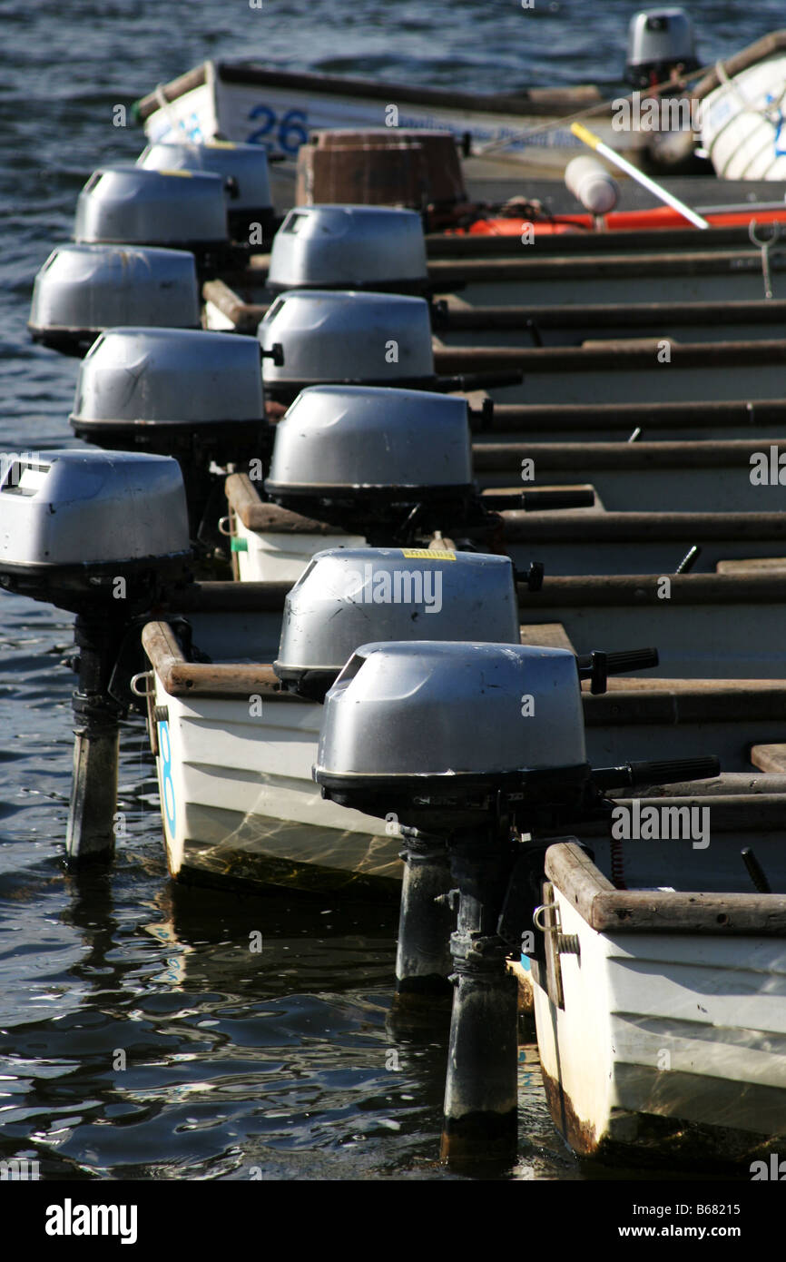 A line of dinghies with outboard motors Stock Photo Alamy