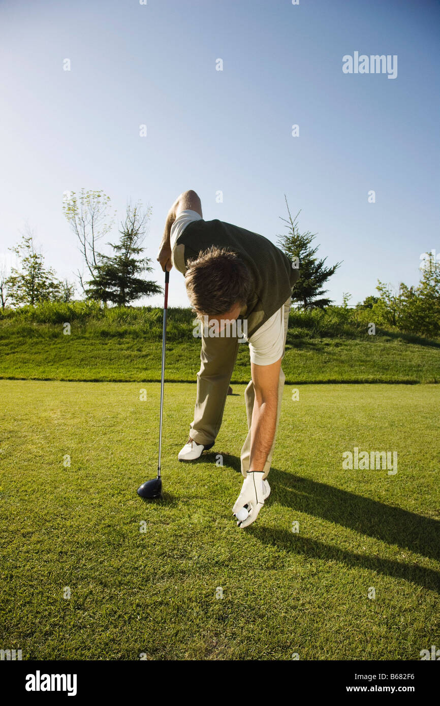 Man Golfing Stock Photo