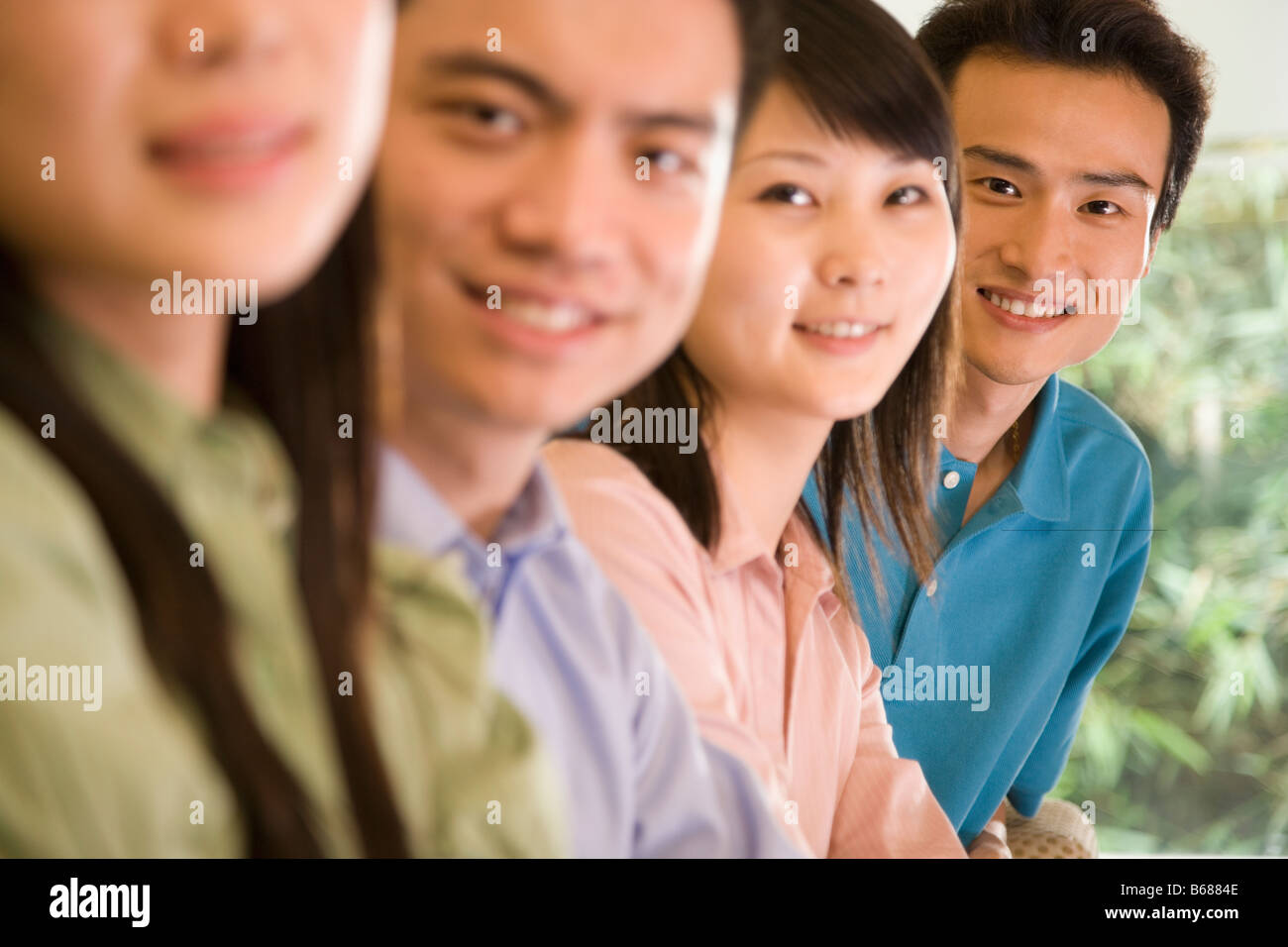 Two young chinese women smile hi-res stock photography and images - Alamy