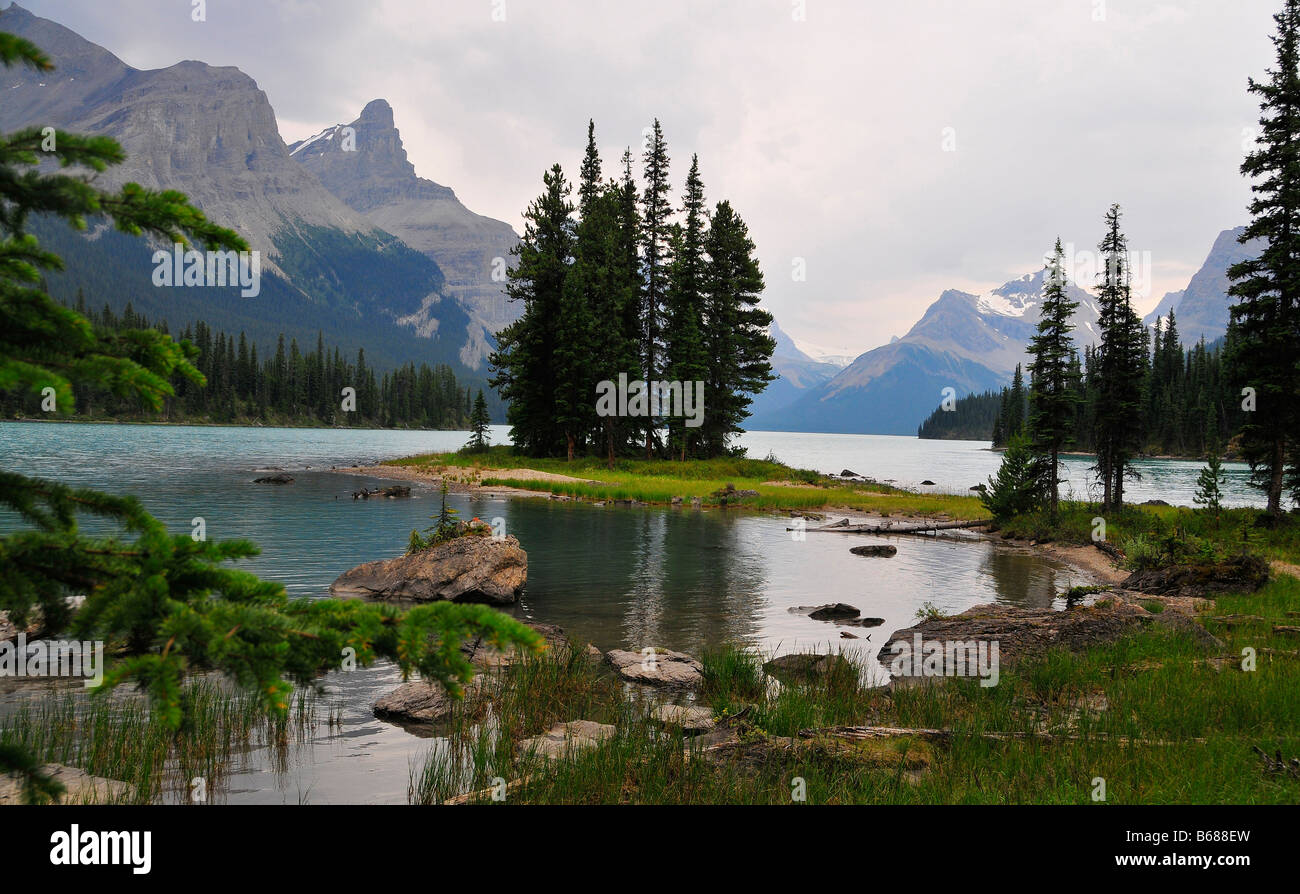 Fishing for trout near beautiful Spirit Island in Canada's Maligne Lake (in the Jasper National Park) is always a scenic treat. Stock Photo
