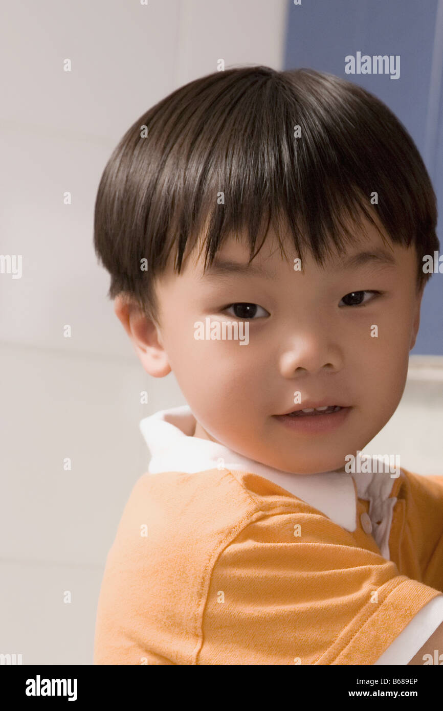 Portrait of a boy smiling Stock Photo - Alamy