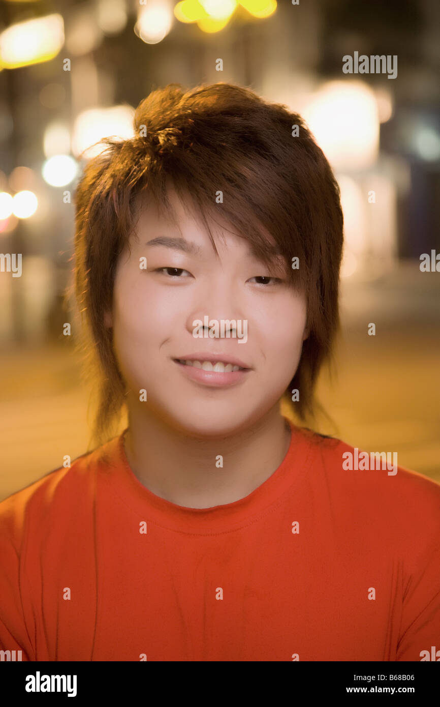Portrait of a young man smiling Stock Photo - Alamy