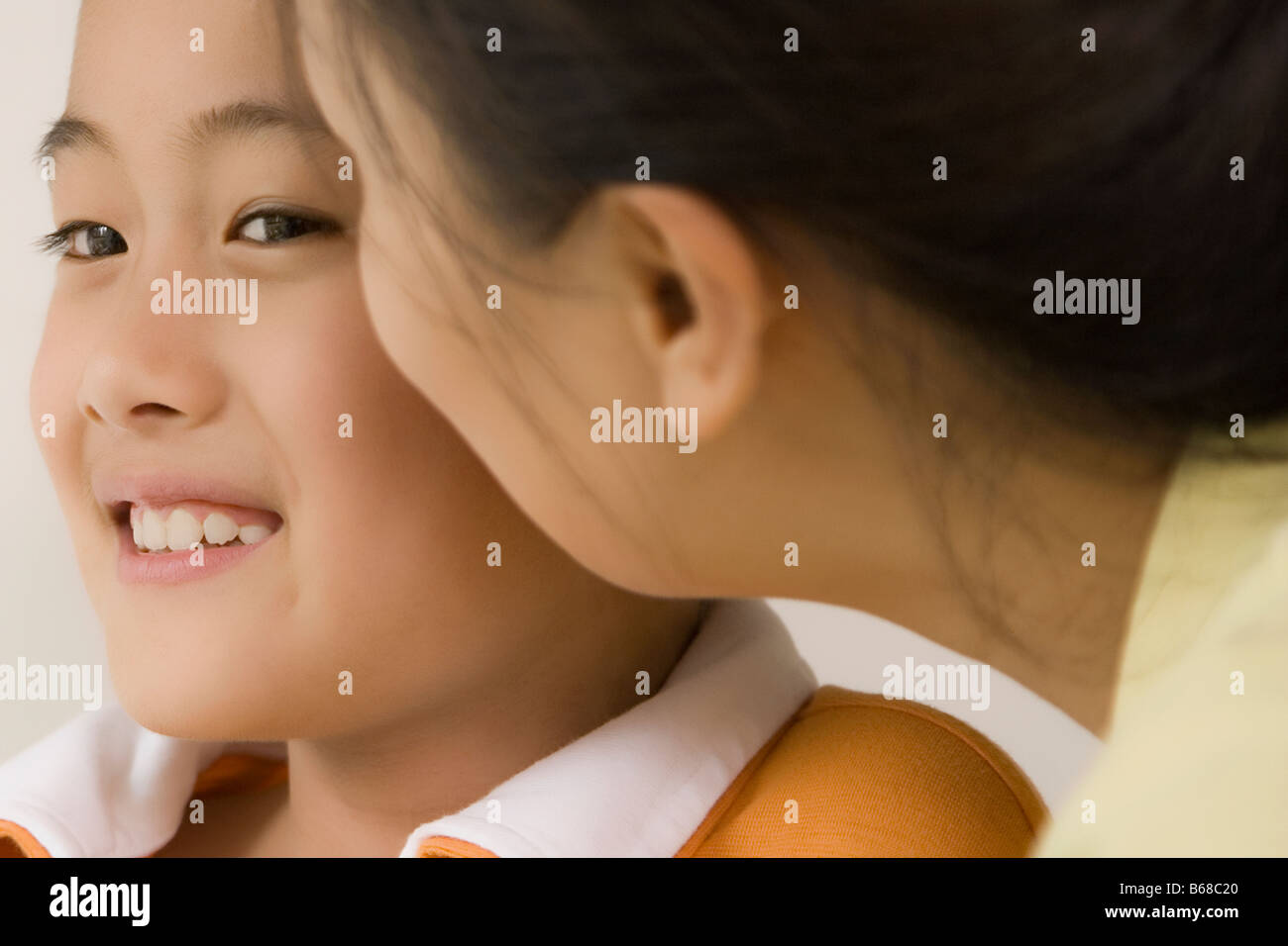 Kissing close up looking away smiling hi-res stock photography and ...