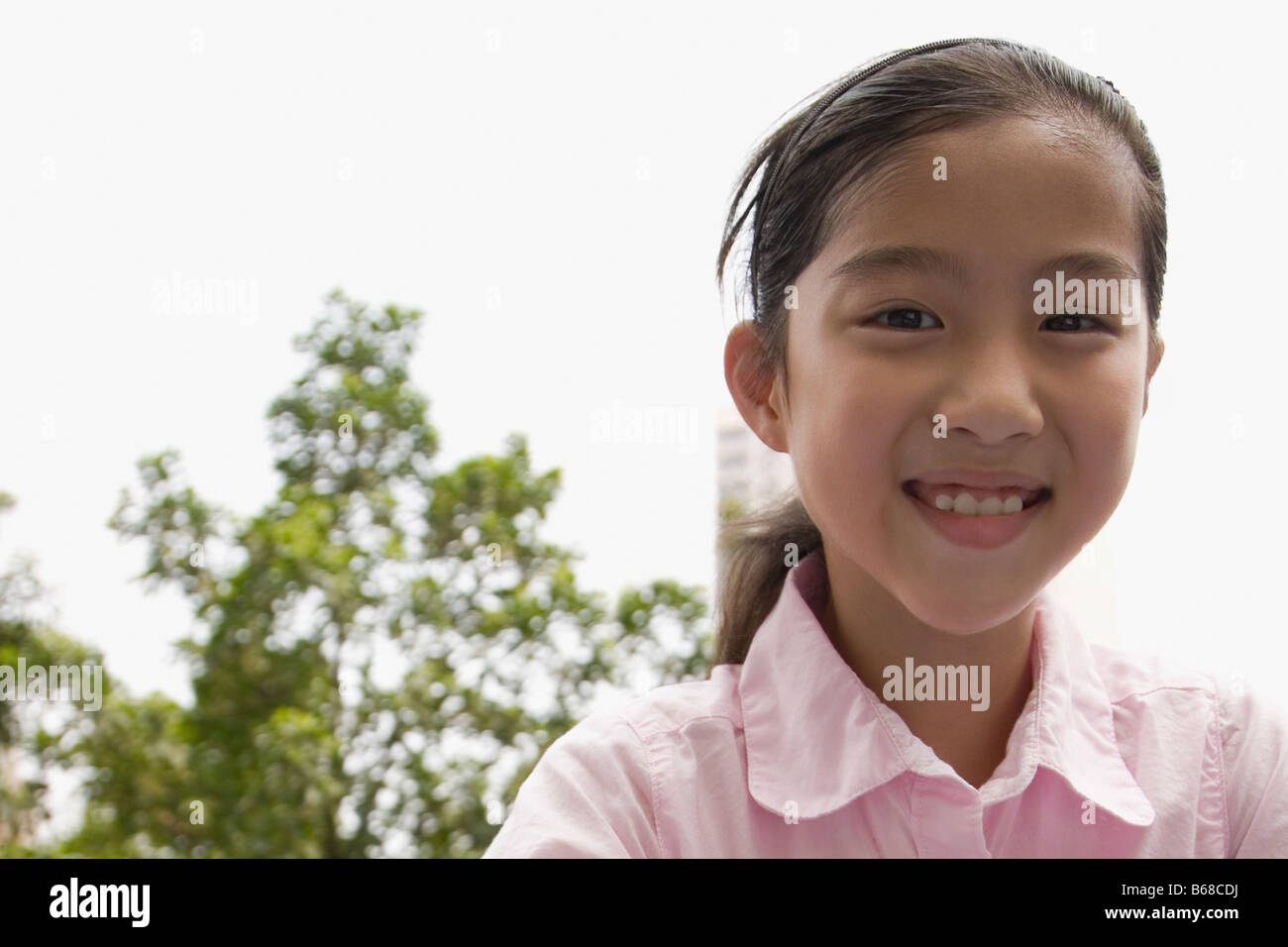 Portrait of a girl smiling Stock Photo - Alamy