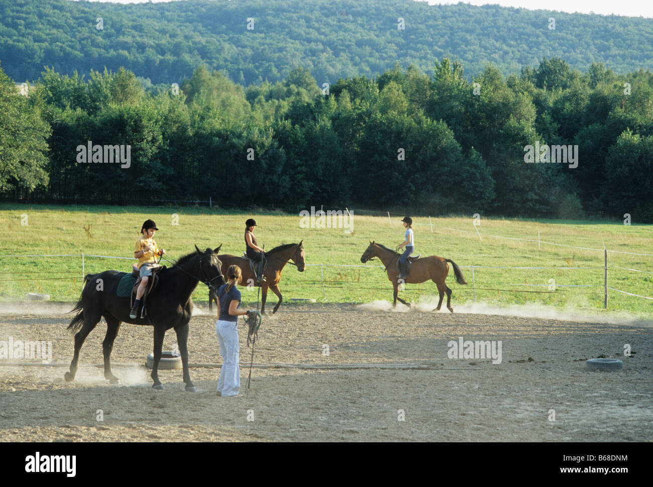 Poland Kapkazy village,  boy takes riding horse lesson Stock Photo