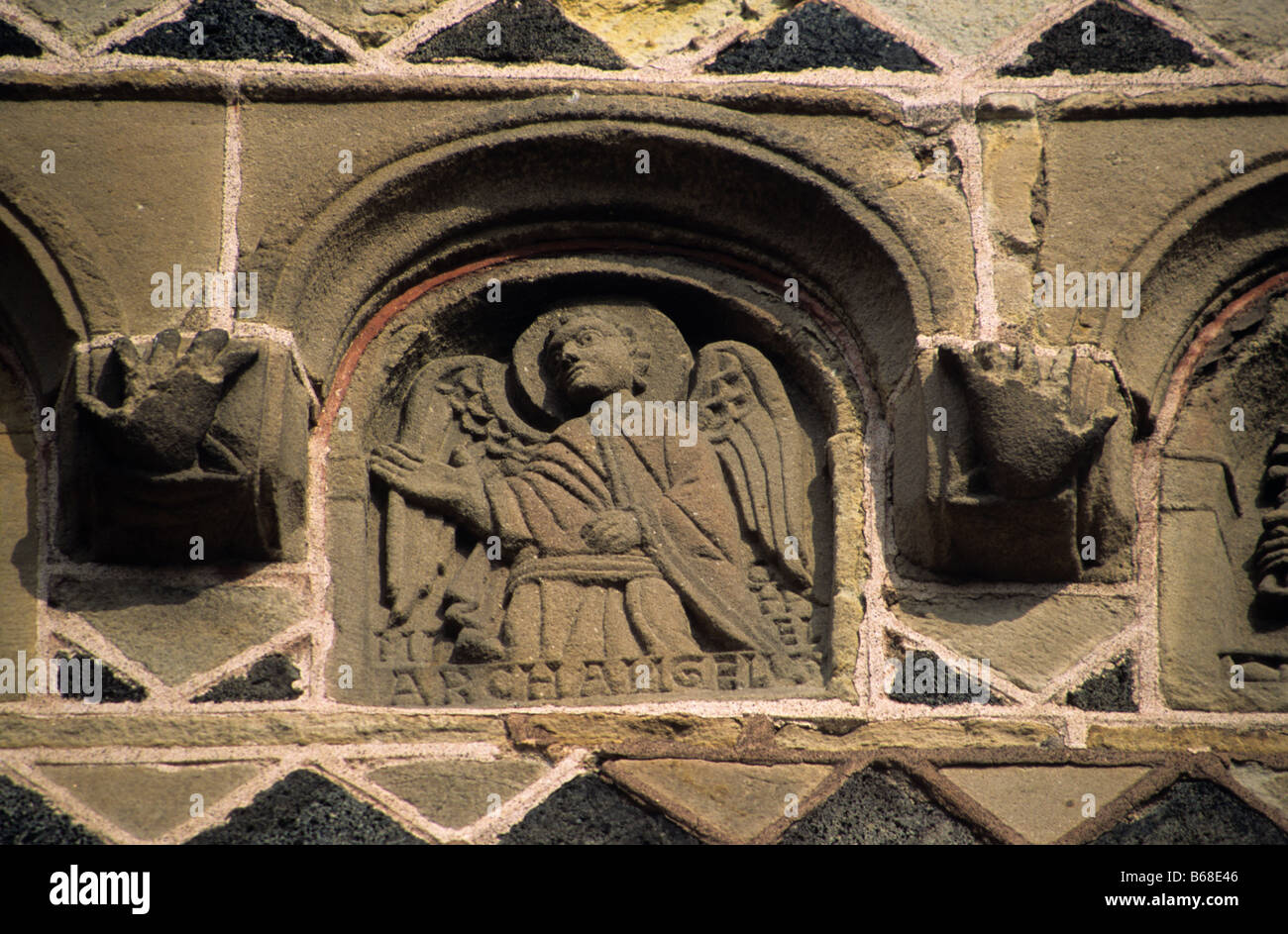 Carving of Archangel Michel or Michael,  Saint Michel d'Aiguilhe Chapel (c11th Romanesque), Le Puy-en-Velay, Haute-Loire, France Stock Photo
