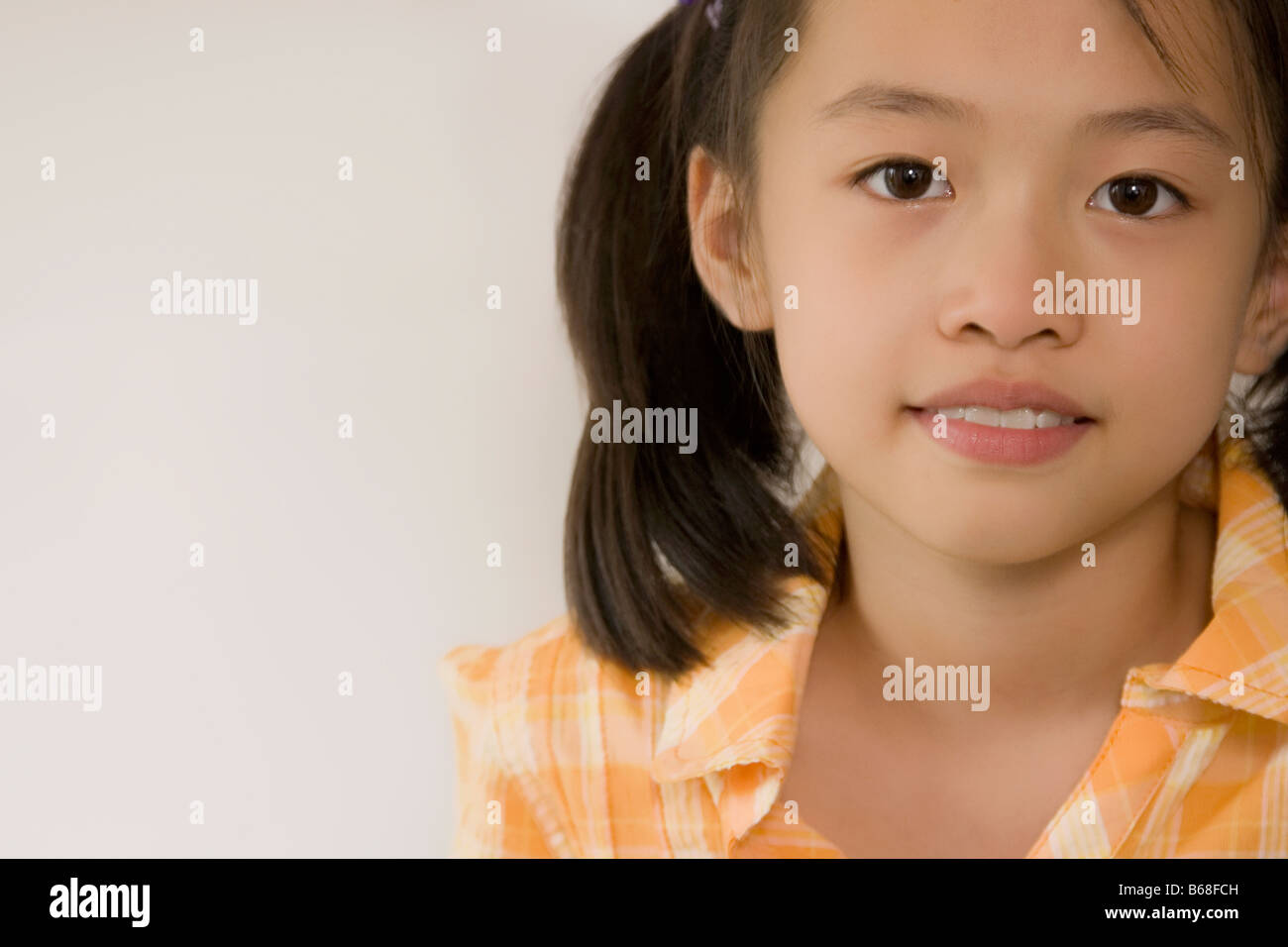Portrait of a girl smiling Stock Photo - Alamy