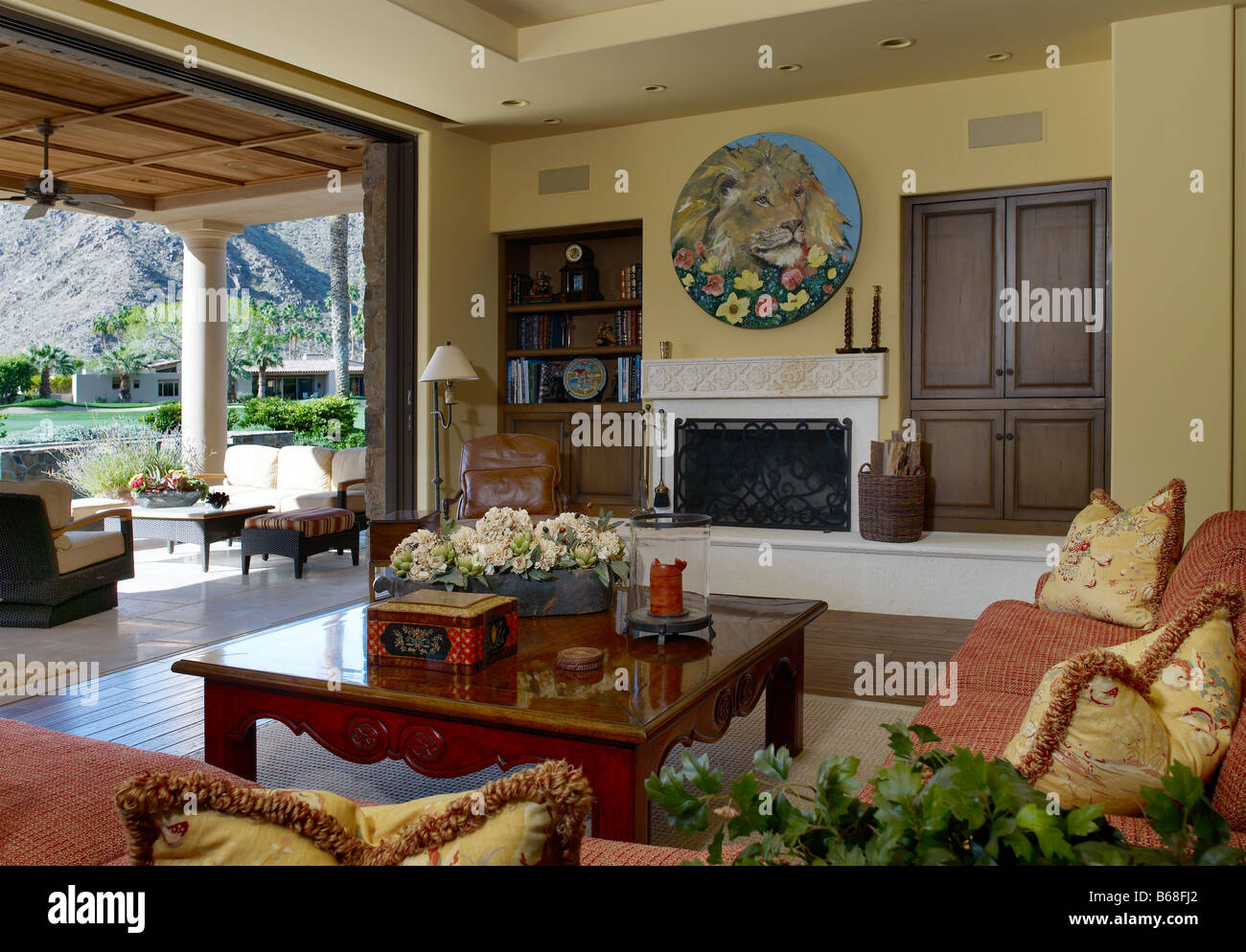 Living room with a view of golf course Stock Photo