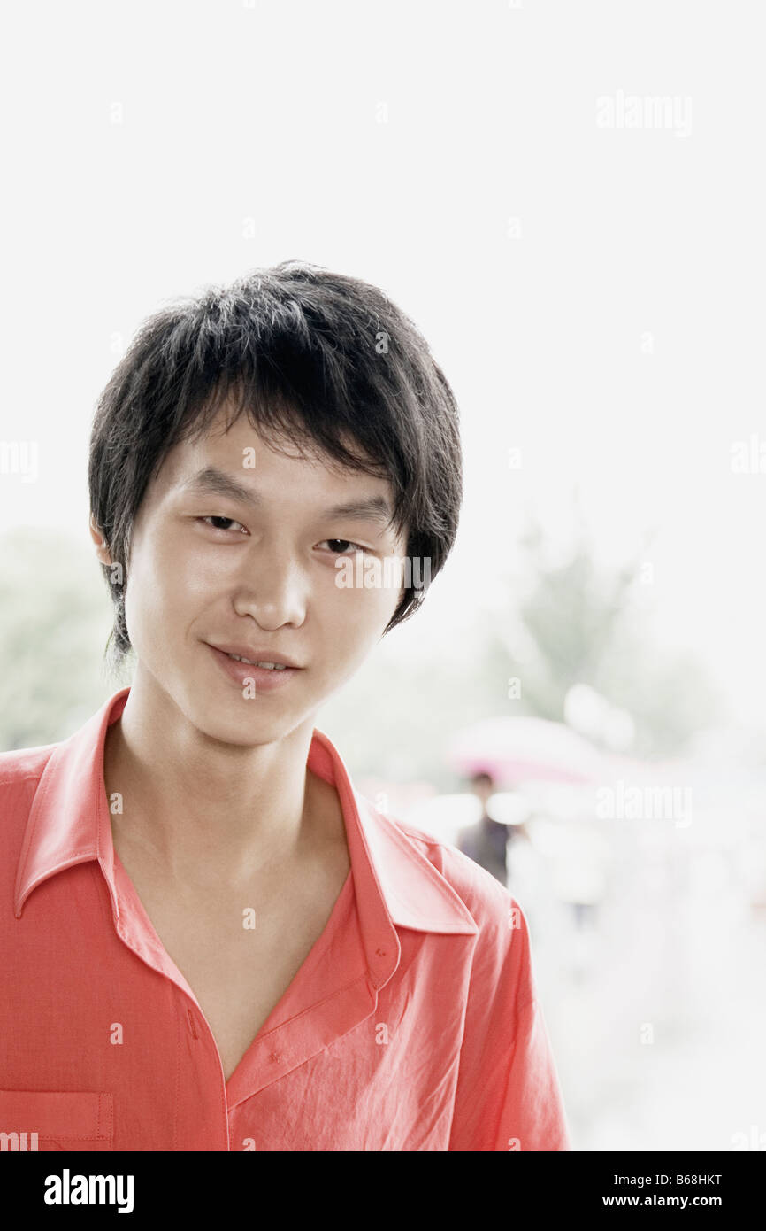 Portrait of a young man smiling Stock Photo - Alamy