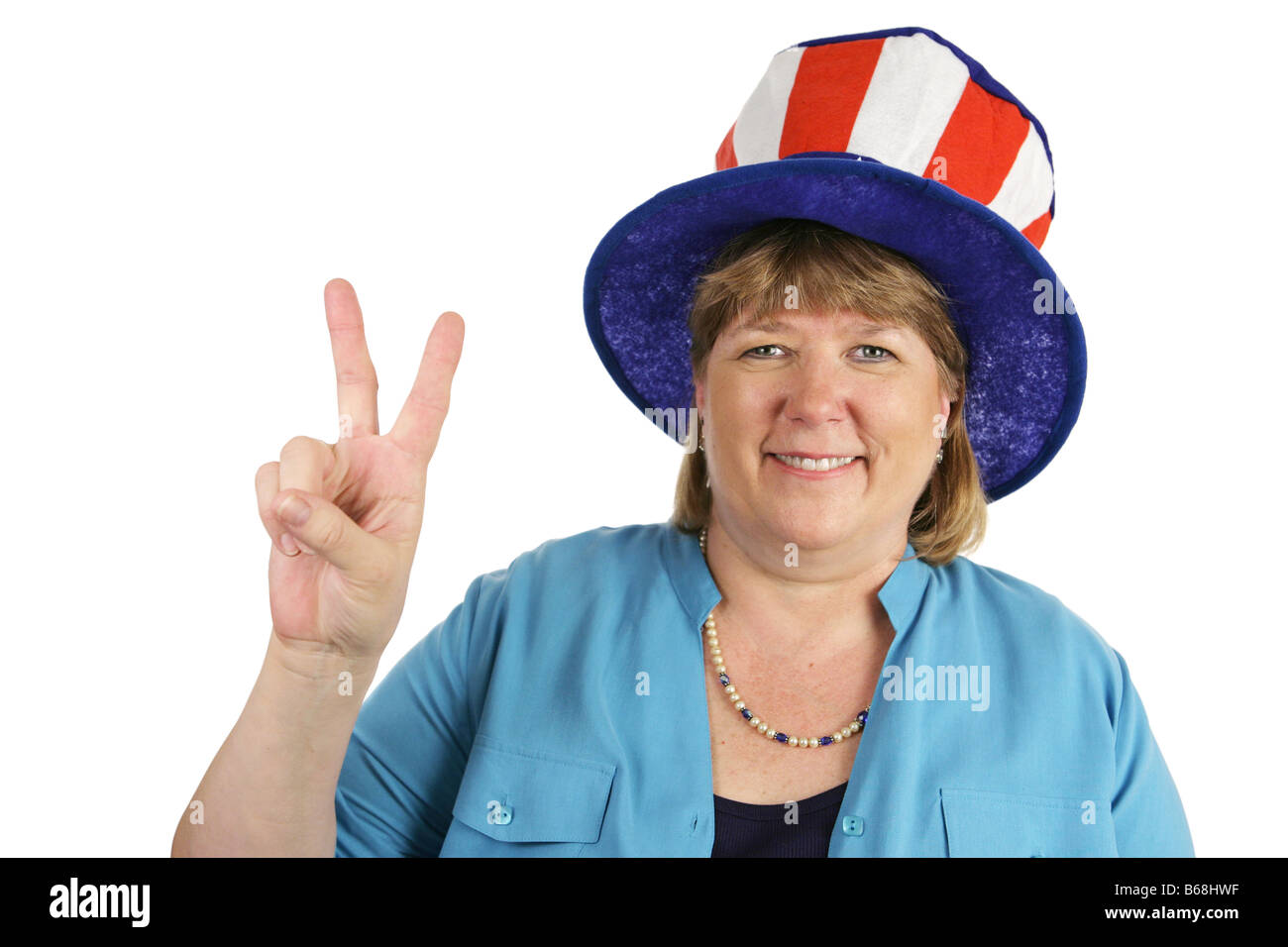 A patriotoc American military wife giving a peace sign Isolated on