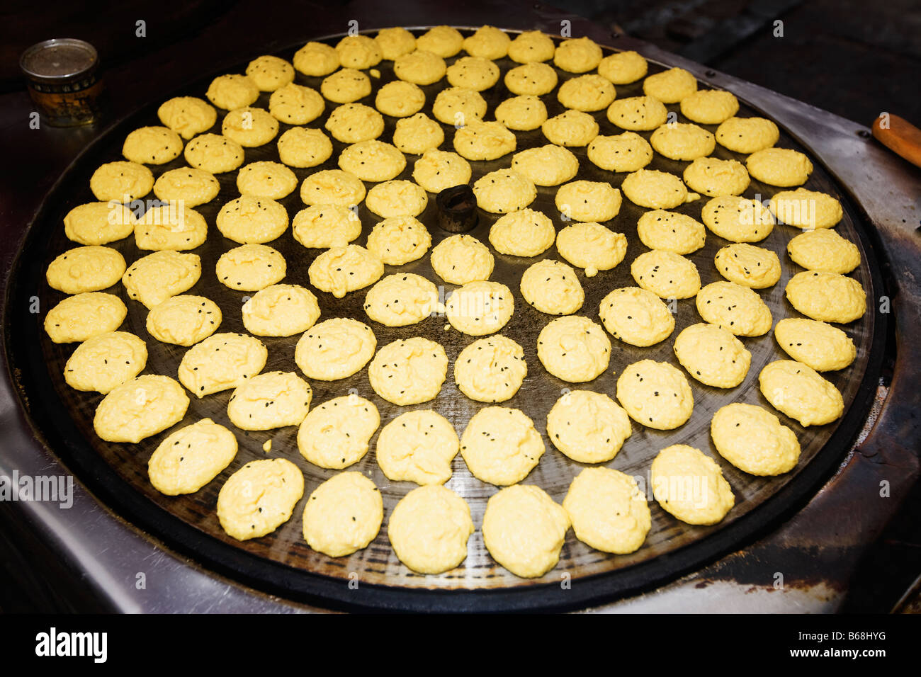 Chinese food on a large pan, Qingdao, Shandong Province, China Stock Photo