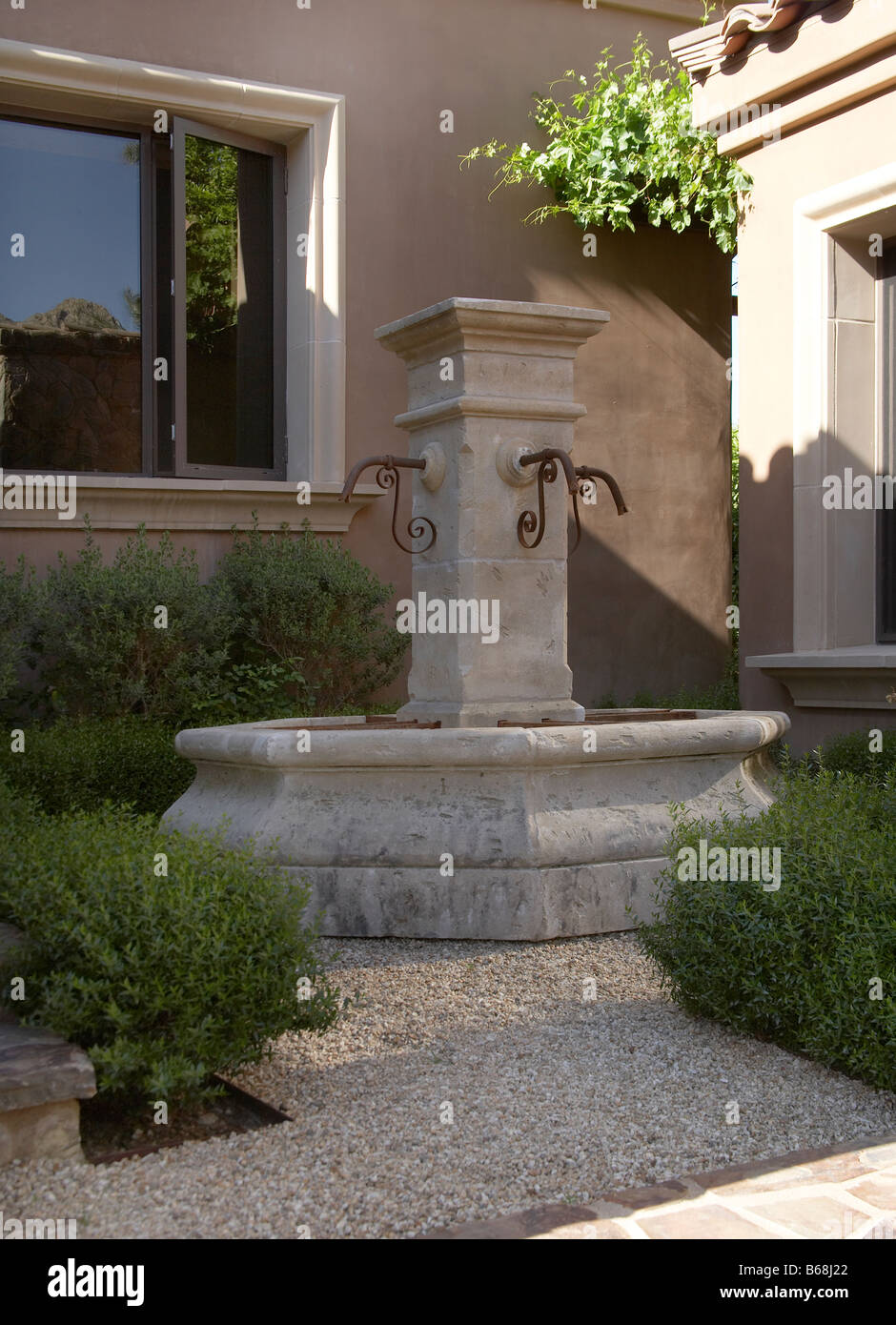 Courtyard tuscan fountain Stock Photo Alamy