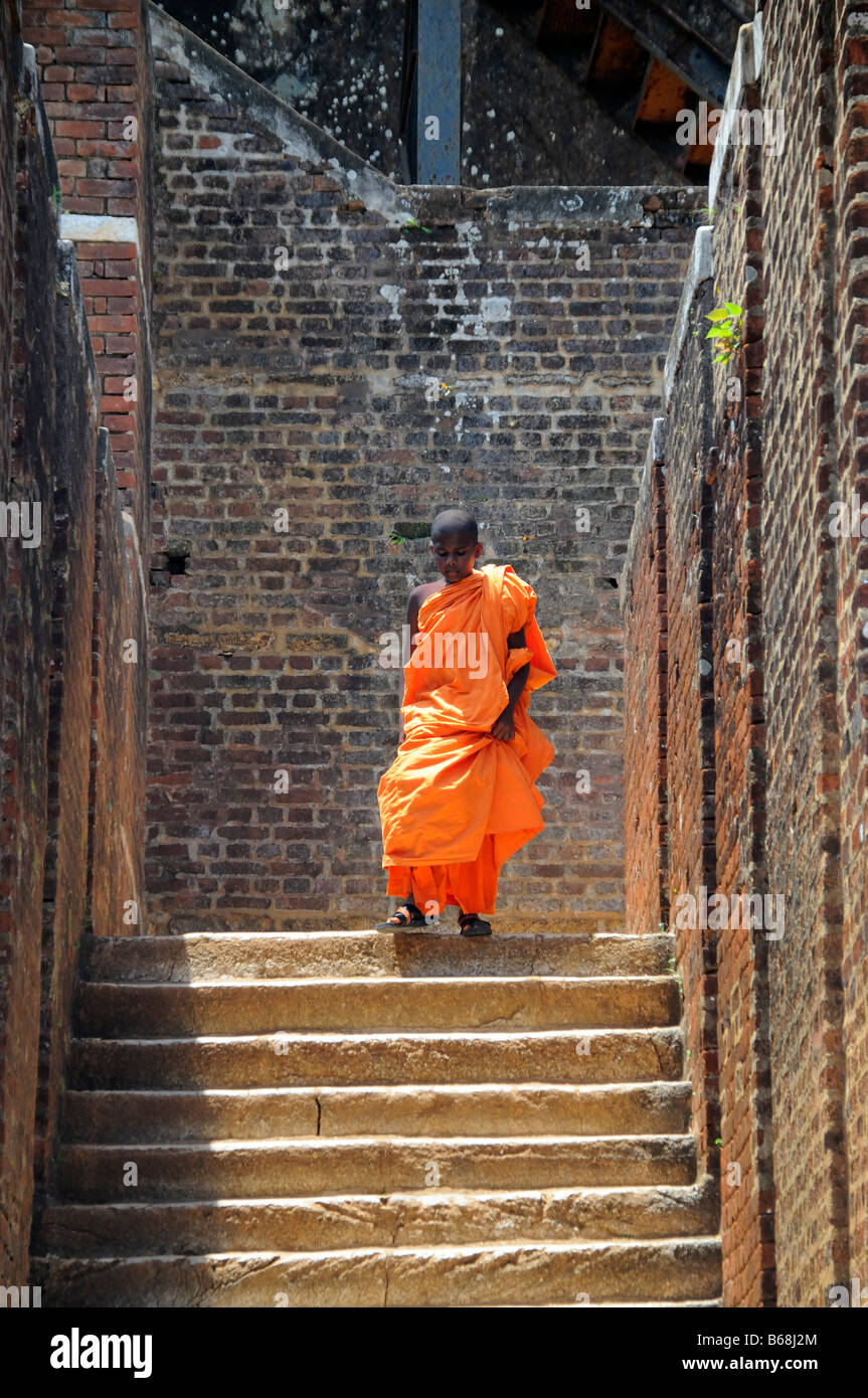 Young Buddist Monk at Sigiriya Rock Fortress Stock Photo
