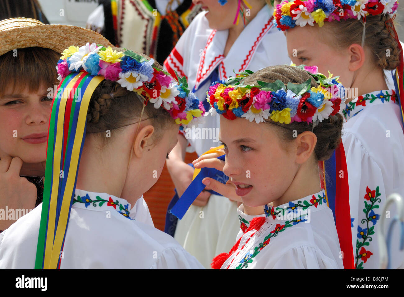 Ukrainian dancers in traditional cultural costumes Stock Photo