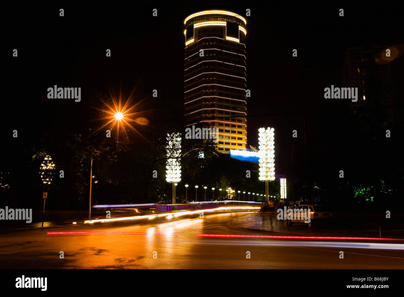 Buildings lit up at night, Hefei, Anhui Province, China Stock Photo