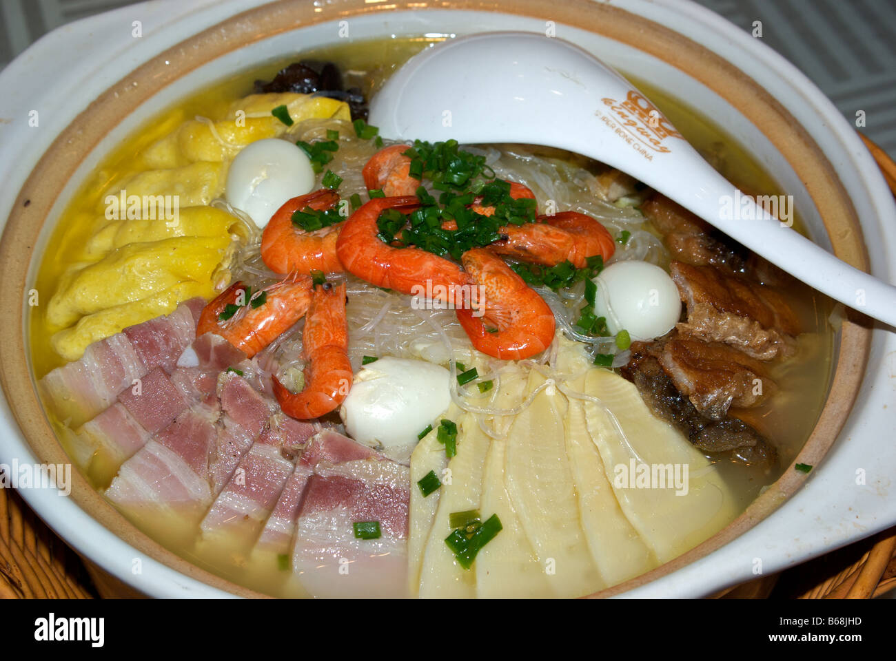 A beautiful many treasure soup at Song He Lou Restaurant on Taijian Street with ham egg rolls