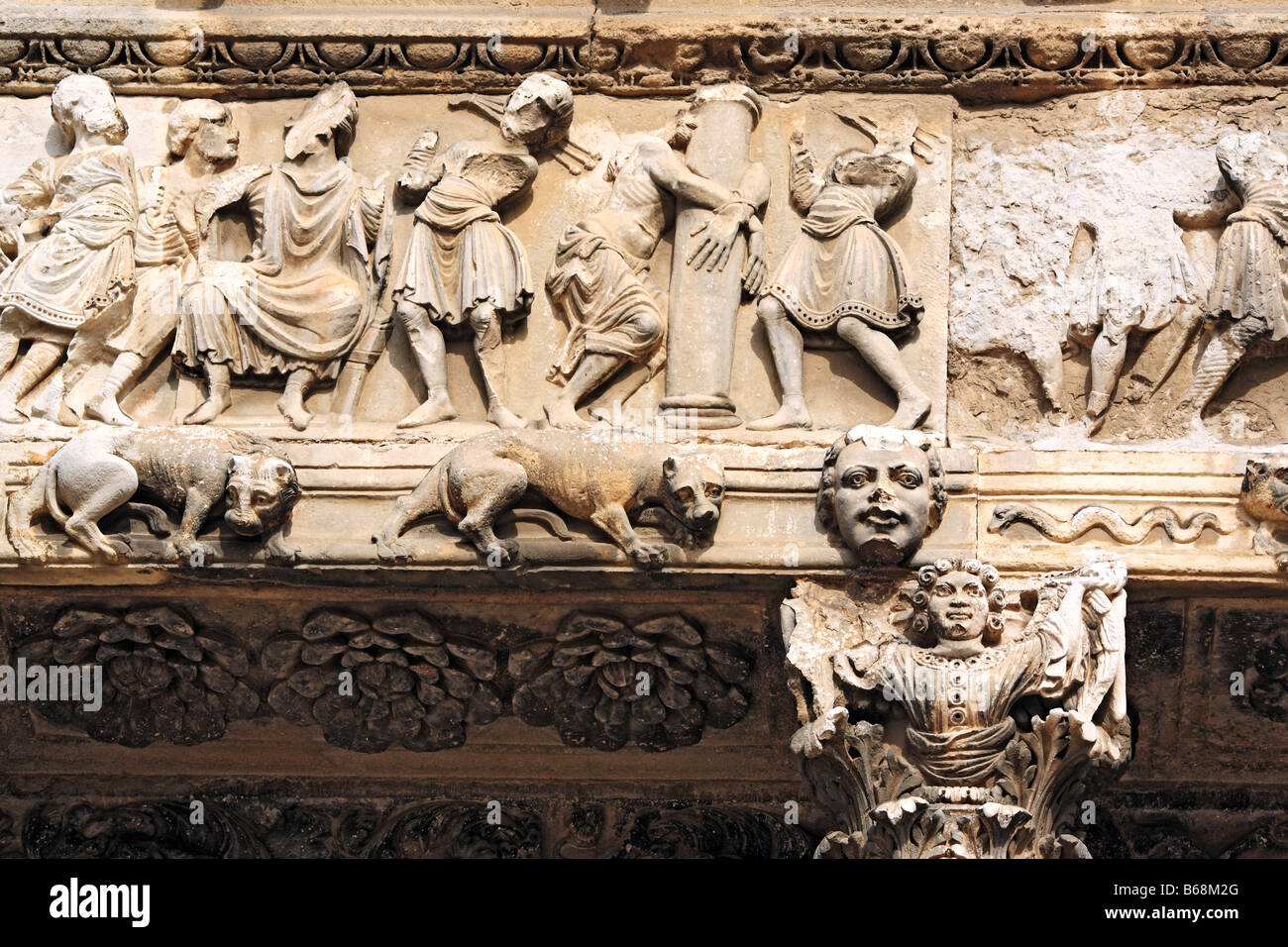 Romanesque bas relief of portal of abbey church (12 century), Saint Gilles (Saint Gilles du Gard), Languedoc Roussillon, France Stock Photo