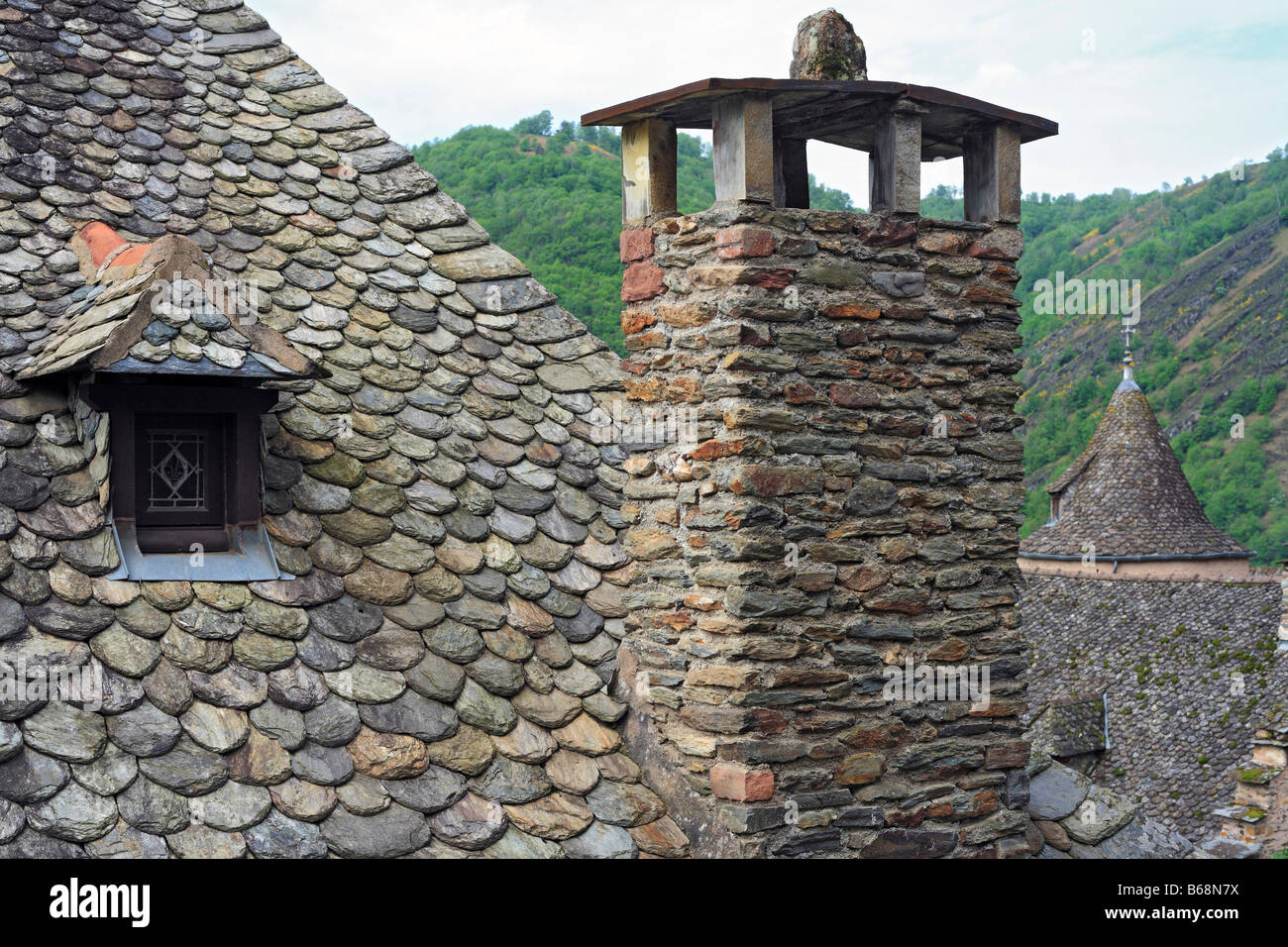 City architecture, country house with traditional slate roof, Conques, France Stock Photo