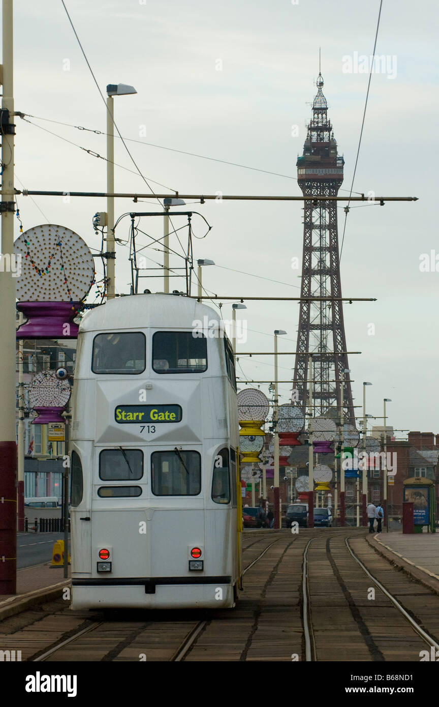 tram travels down the promenade on Blackpools North Shore Stock Photo