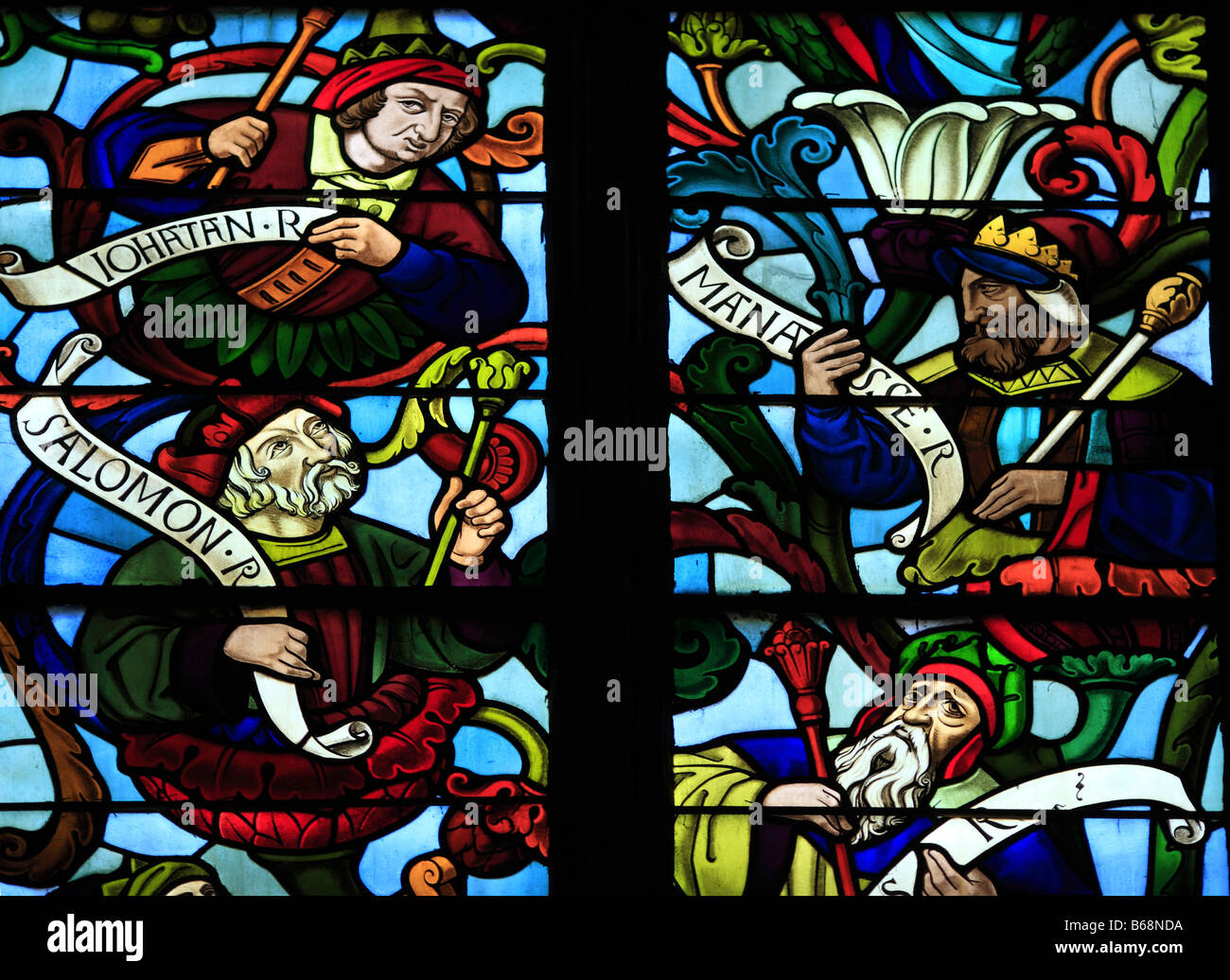 Coloured stained window, Glass painting in the cathedral Notre Dame la Grande (12 century), Poitiers, Poitou, France Stock Photo