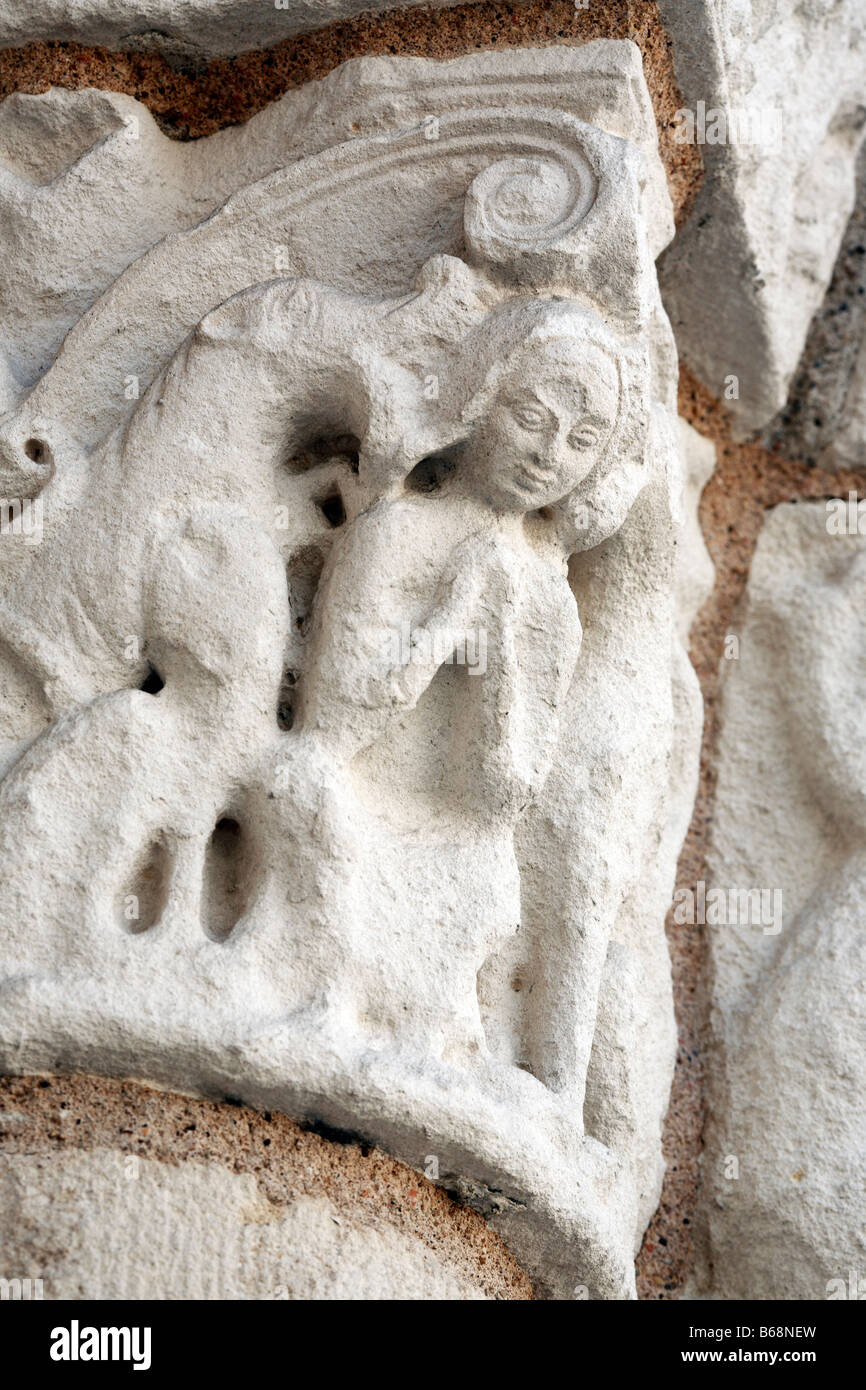 Romanesque stone bas relief on portal of the cathedral Notre Dame la Grande (12 century), Poitiers, Poitou, France Stock Photo